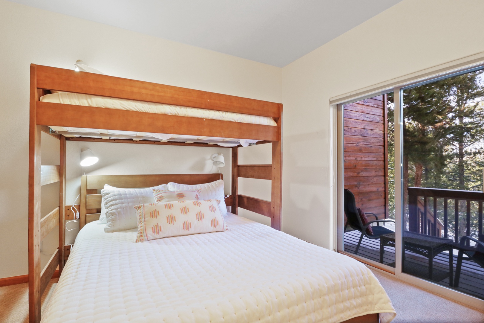 Rest peacefully in your cozy bunk bed, then step onto your private balcony for fresh mountain air.