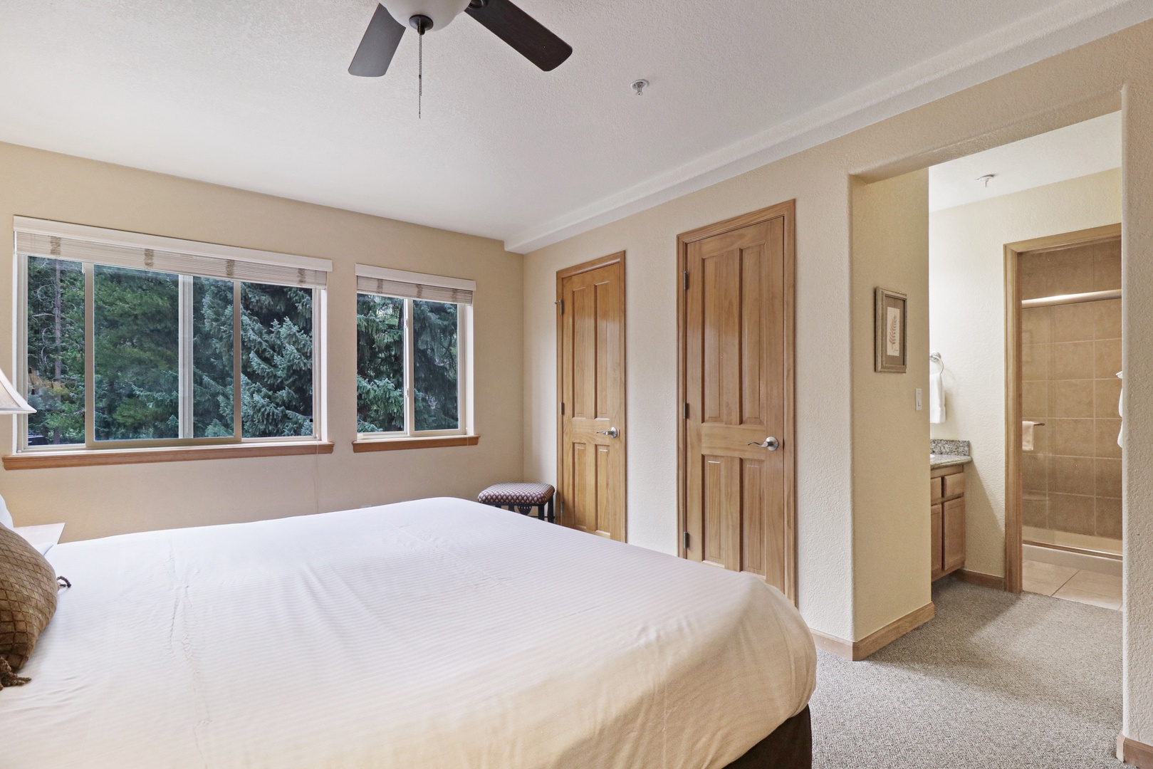 Slip into crisp, clean linens and unwind in your peaceful bedroom retreat, with soft carpeting underfoot and natural light filtering through the windows to greet you each morning.