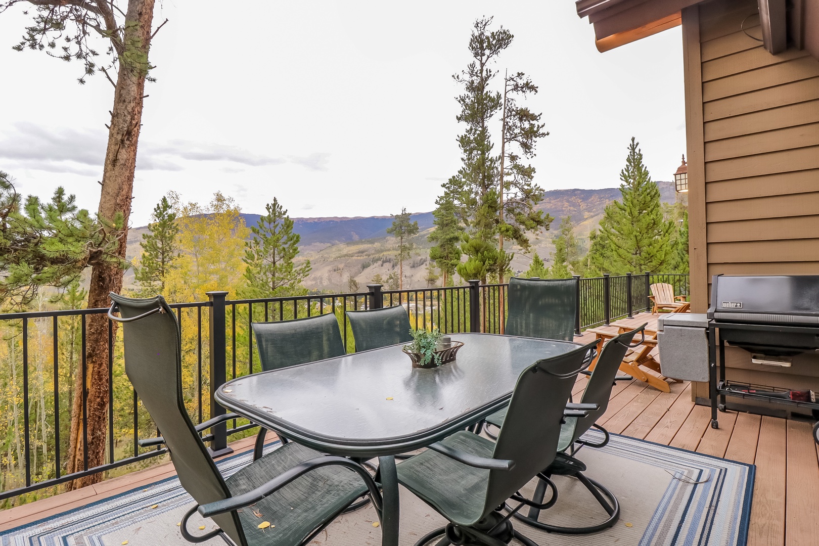 Sweeping mountain views frame your deck, where pine-scented air and fall foliage colors create the perfect backdrop for grilling, al fresco dining, and unwinding under open skies.