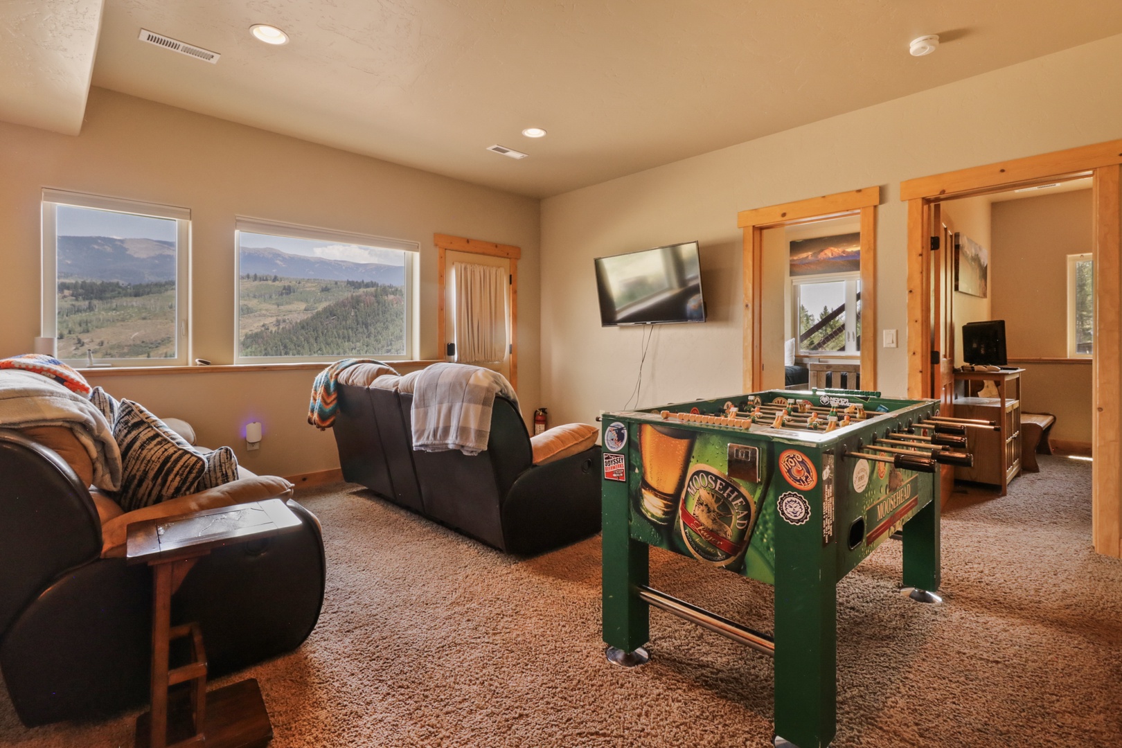 Challenge friends or family to a game of foosball in this inviting space, where mountain views through the windows set the perfect backdrop for your vacation fun.