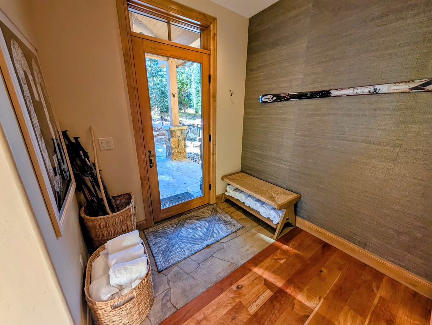 Entrance to backyard, grill area, and hot tub