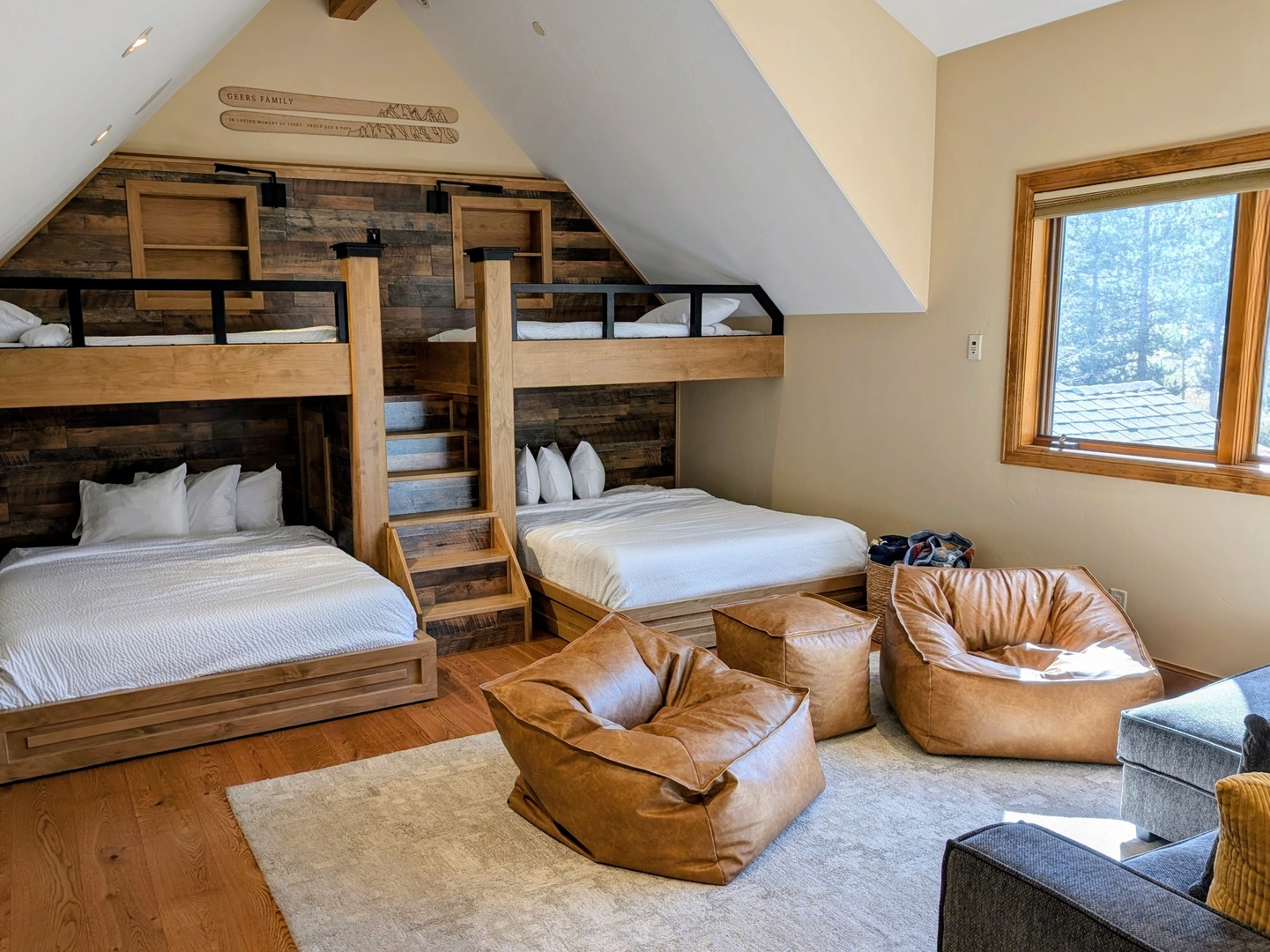 Spacious sleeping area and hang out space, overlooking the forested back yard.