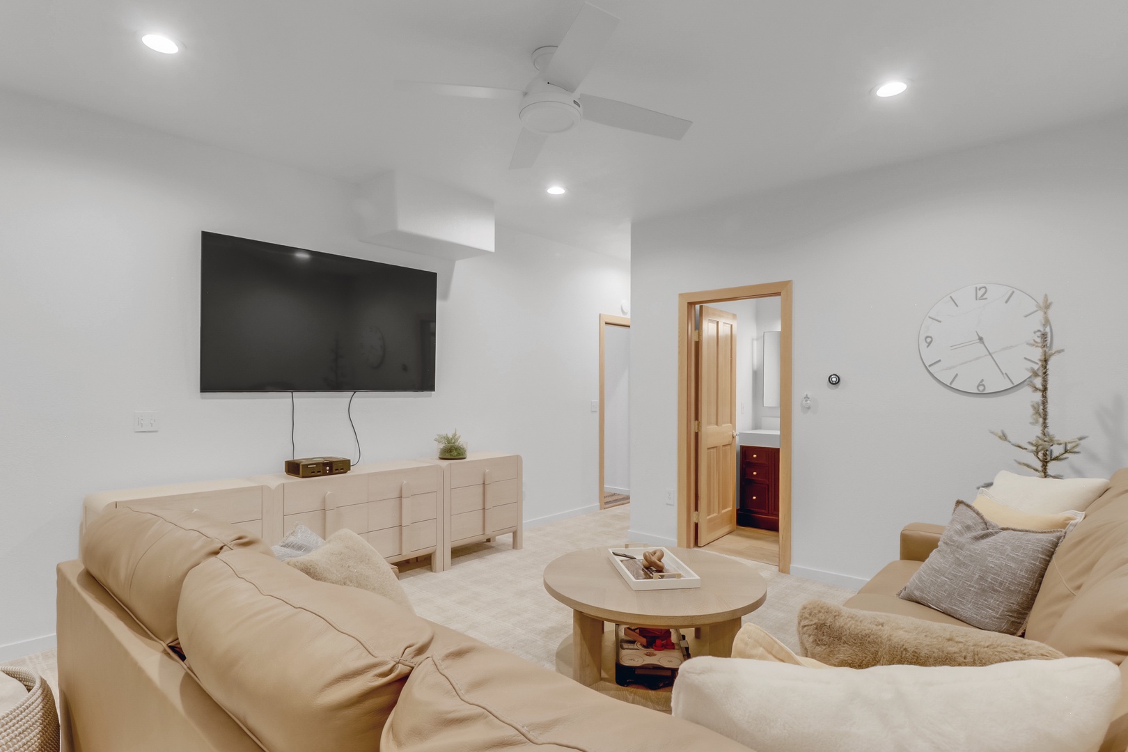 Unwind in your bright living space with plush seating, modern entertainment, and thoughtful touches that make every moment feel like home.