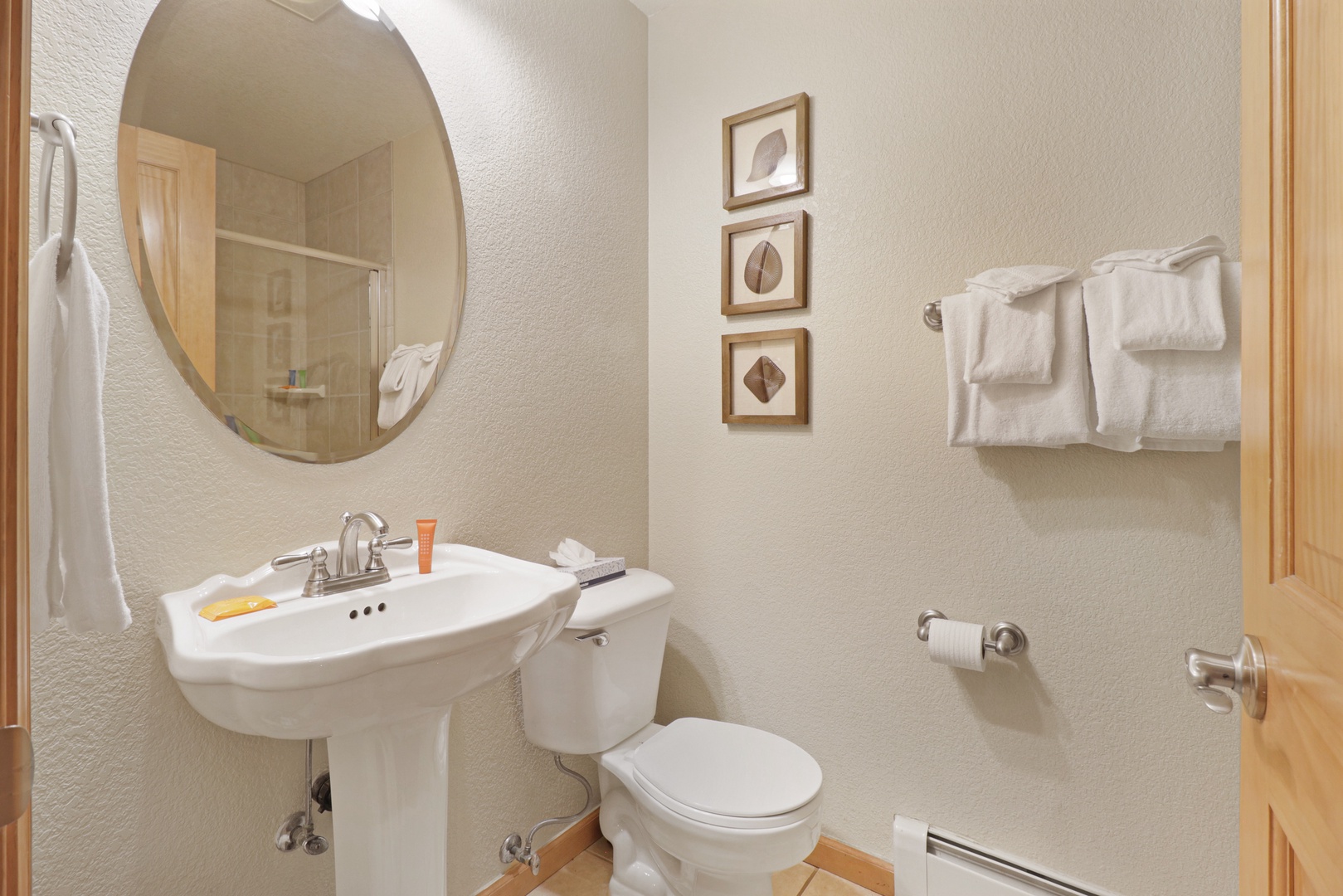 Freshen up in your private bathroom, complete with soft towels and thoughtful touches to help you feel right at home.