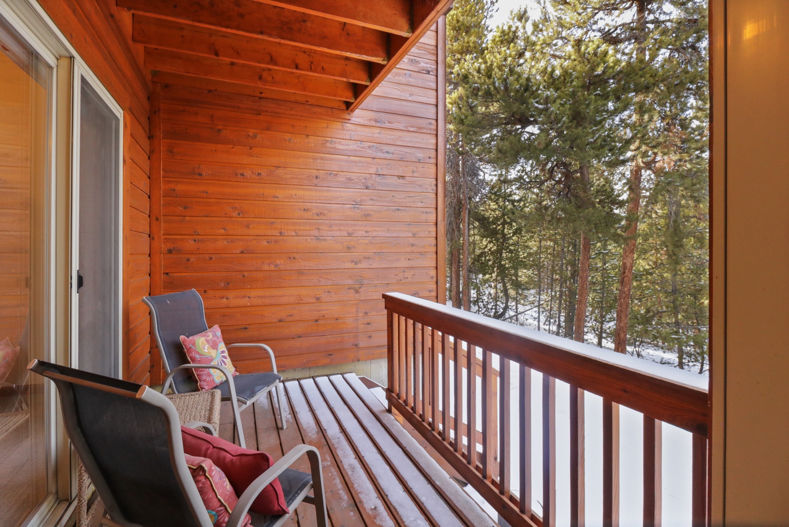 Step onto your private balcony and breathe in the crisp mountain air while taking in the peaceful winter forest views.