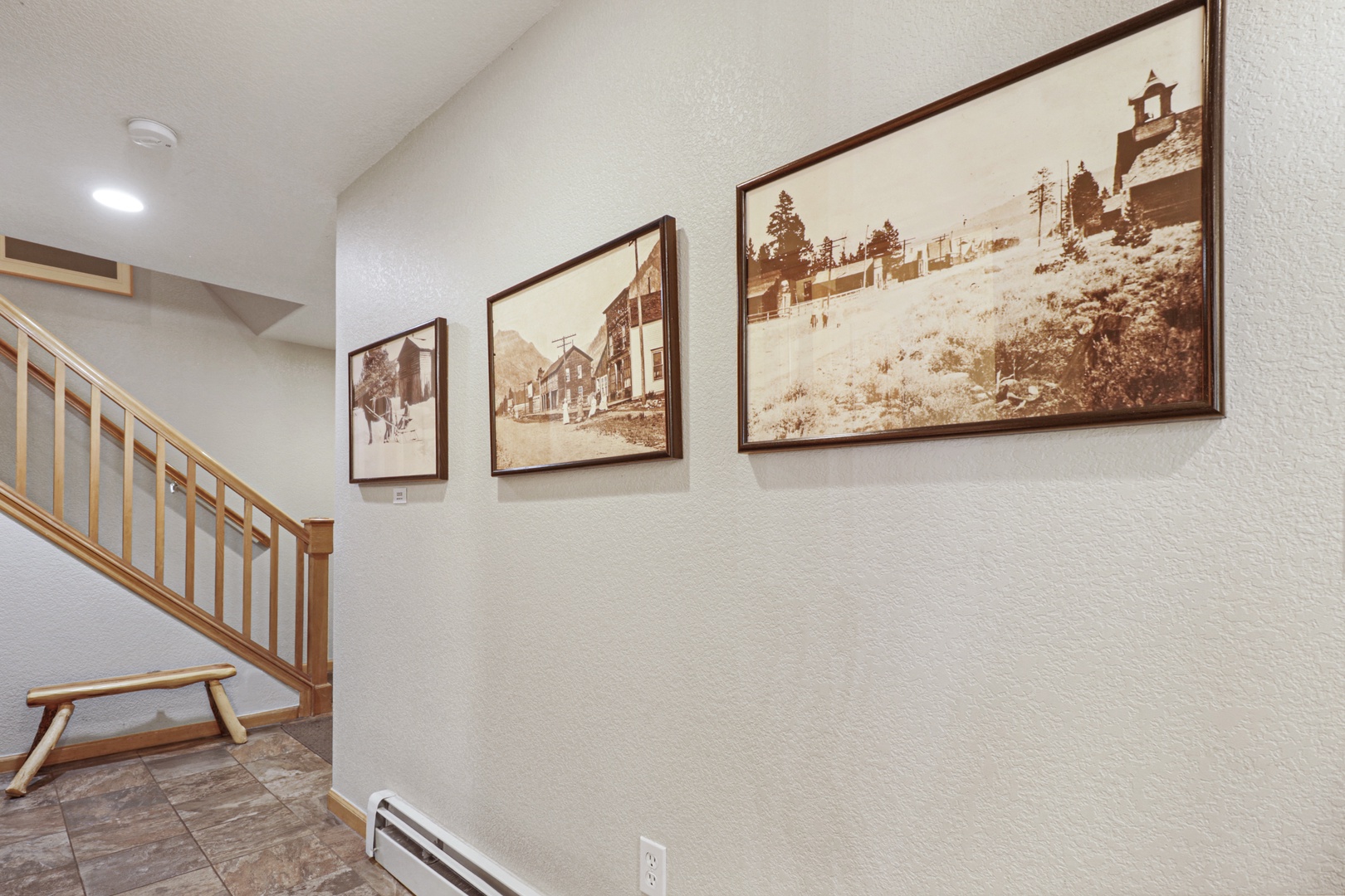 Step inside and feel instantly at home in this welcoming entryway, where high ceilings and natural light create a spacious, airy feel as you arrive at your retreat.