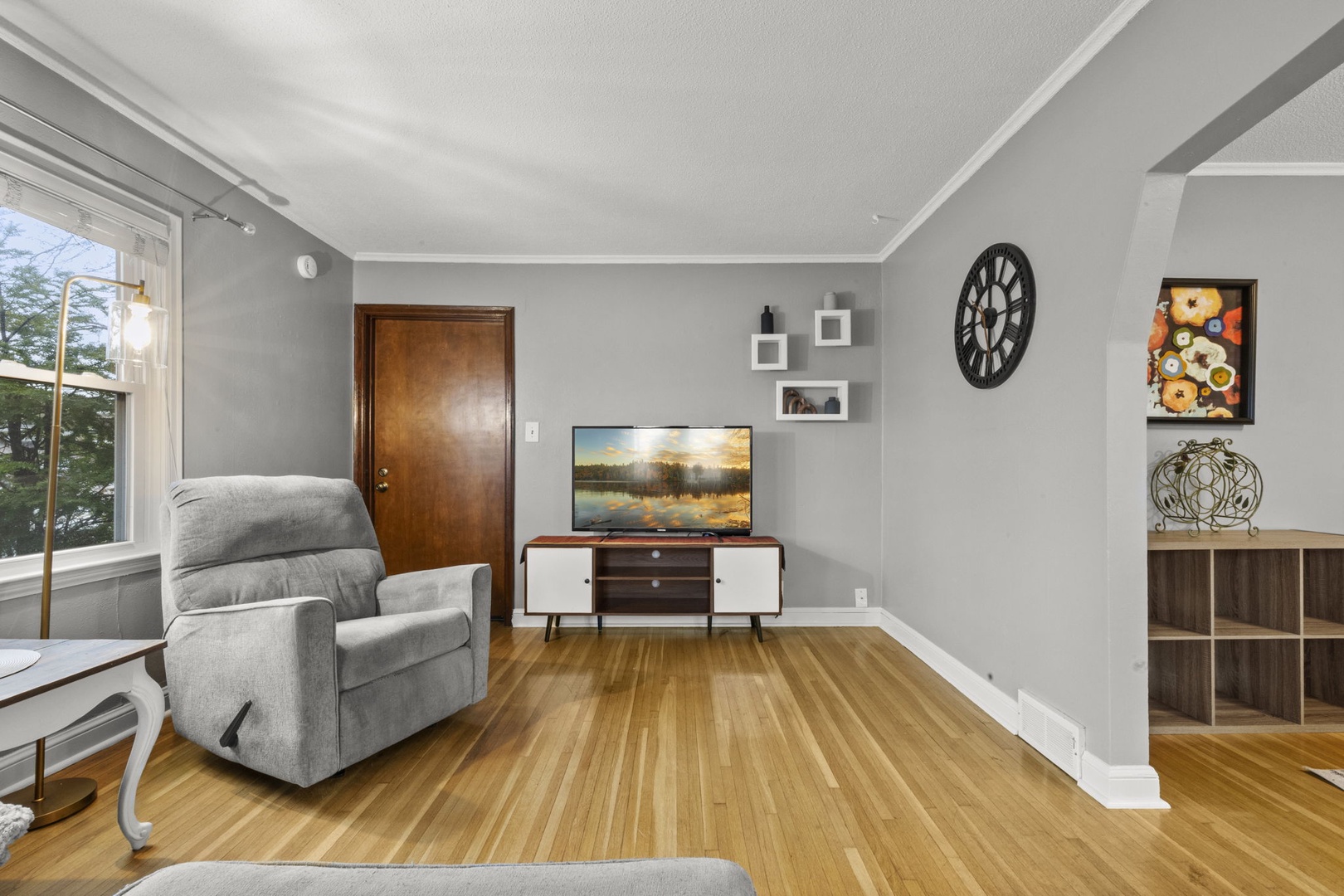 Unwind in your cozy living room with natural light, modern décor, and a flat-screen TV for relaxing evenings in.