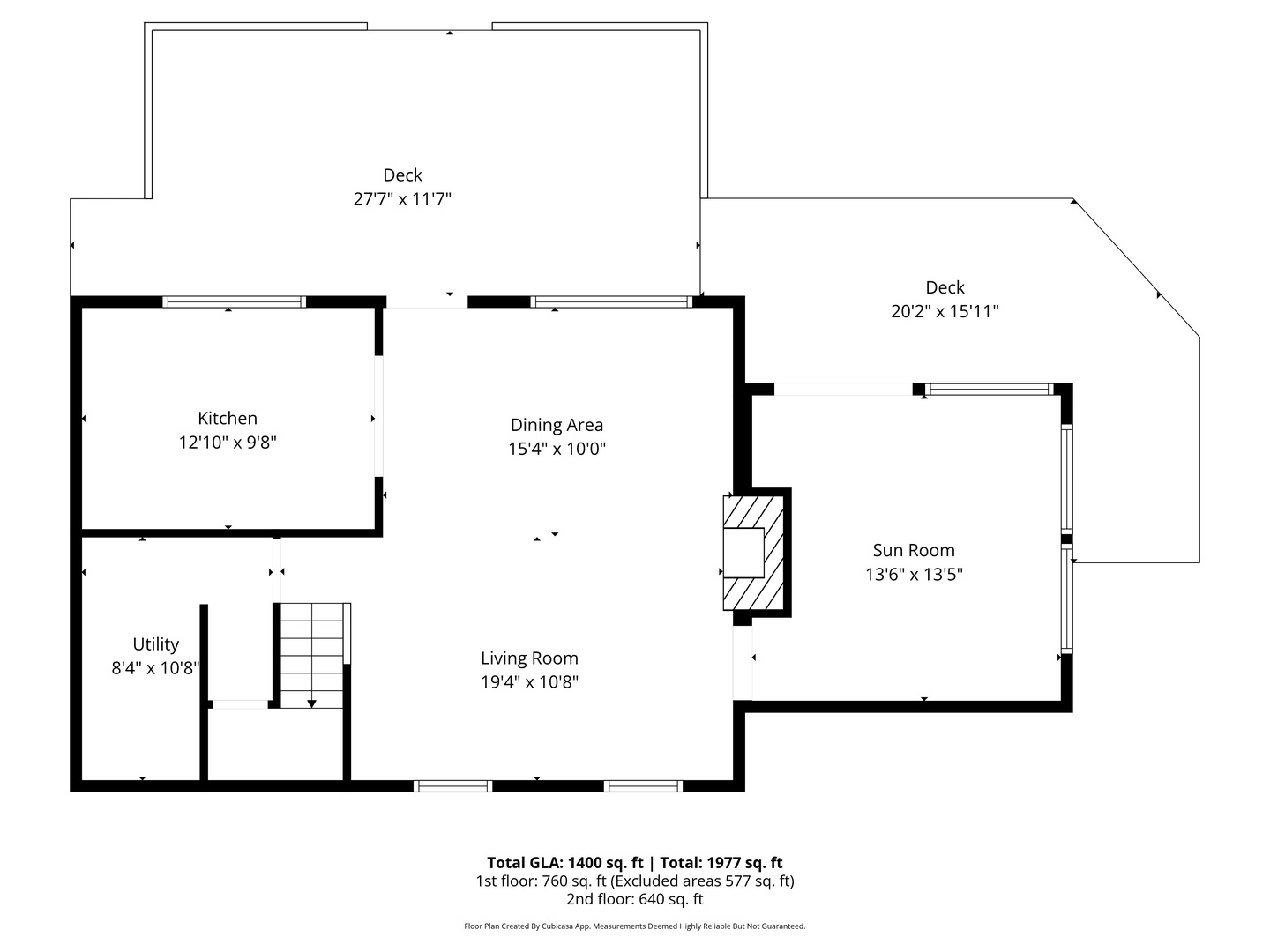 Floorplan of lower level with living room, sunroom, and kitchen.