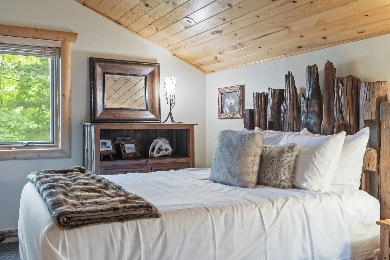 Your cozy bedroom retreat blends rustic charm with modern comfort. Natural wood accents, plush bedding, and soft textures create a warm space where relaxation comes naturally.