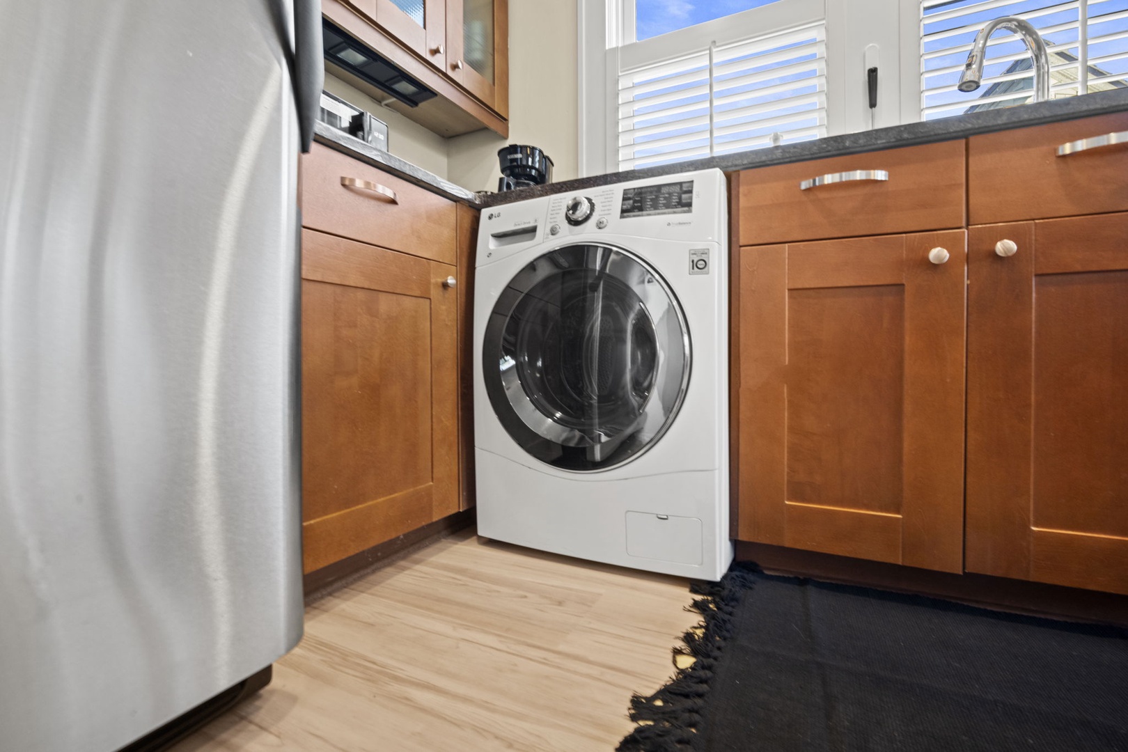 Washer and dryer combo in unit. Full laundry in building.