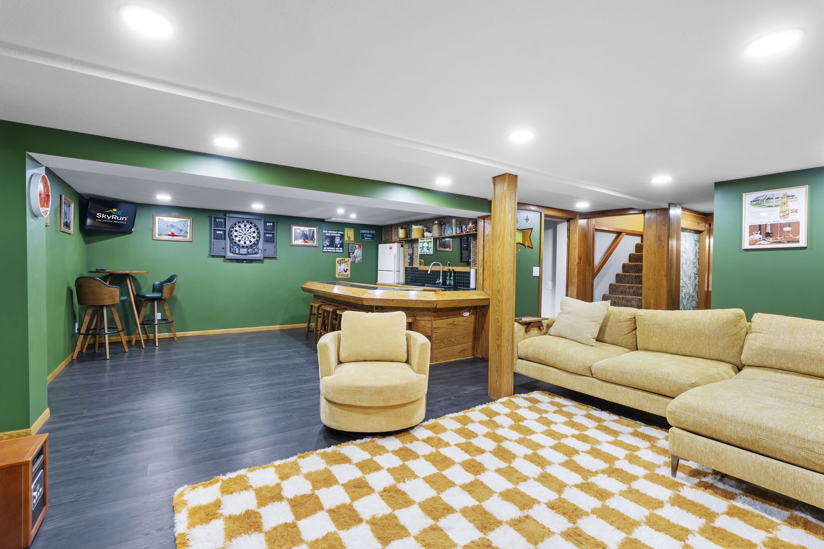 Your private entertainment haven awaits with plush seating, game space, and a fully equipped bar for memorable evenings.