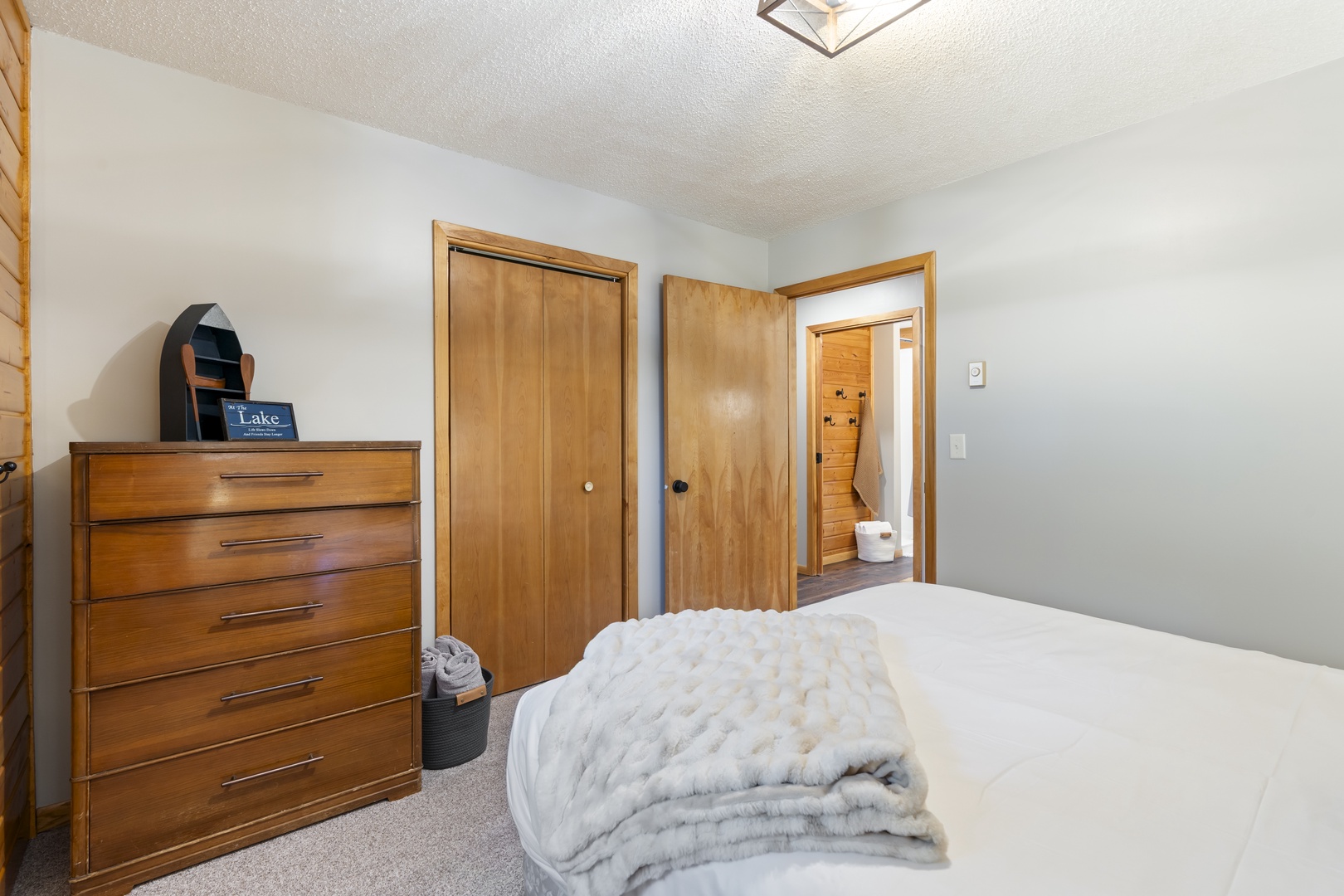 Slip into comfort in your cozy bedroom, complete with soft linens and ample storage for all your vacation essentials.