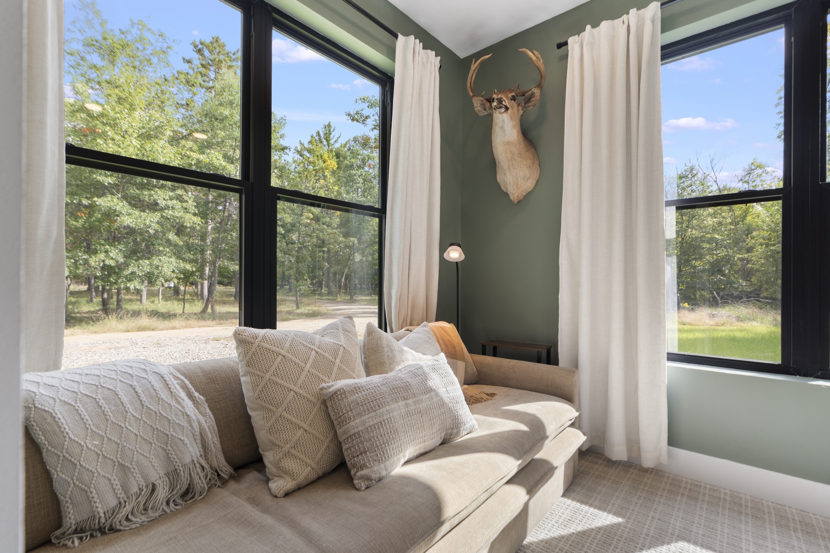 Bedroom 3 (office): queen pull-out sofa bed with wooded views