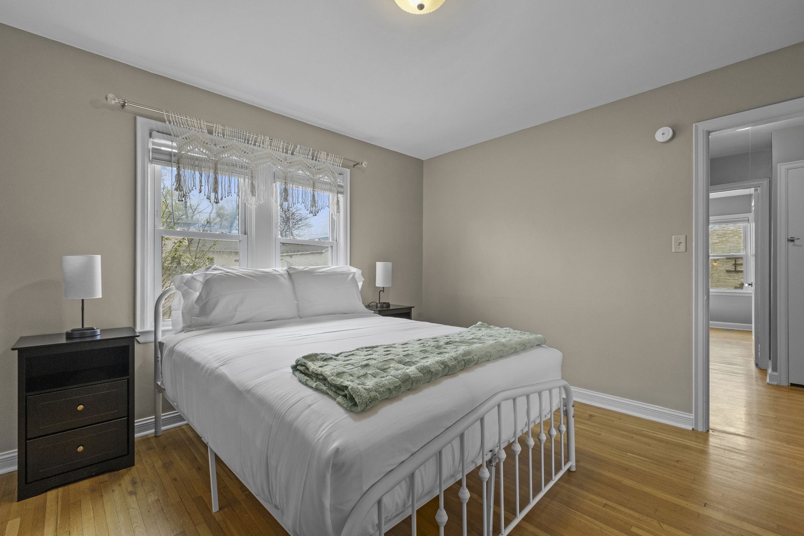 Unwind in your peaceful retreat with crisp linens, soft natural light, and warm hardwood floors welcoming you home after a day of adventure.
