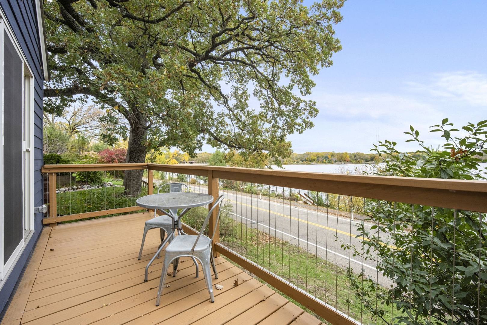 Step onto your private deck and breathe in views of the peaceful lake framed by mature trees. Enjoy morning coffee or evening relaxation at this quiet outdoor perch with natural scenery all around.