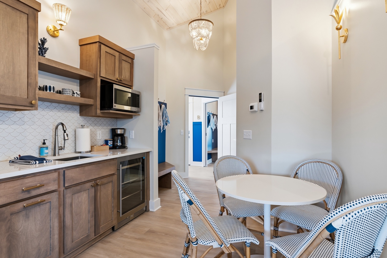 Kitchenette with wine cooler bistro dining and coastal charm