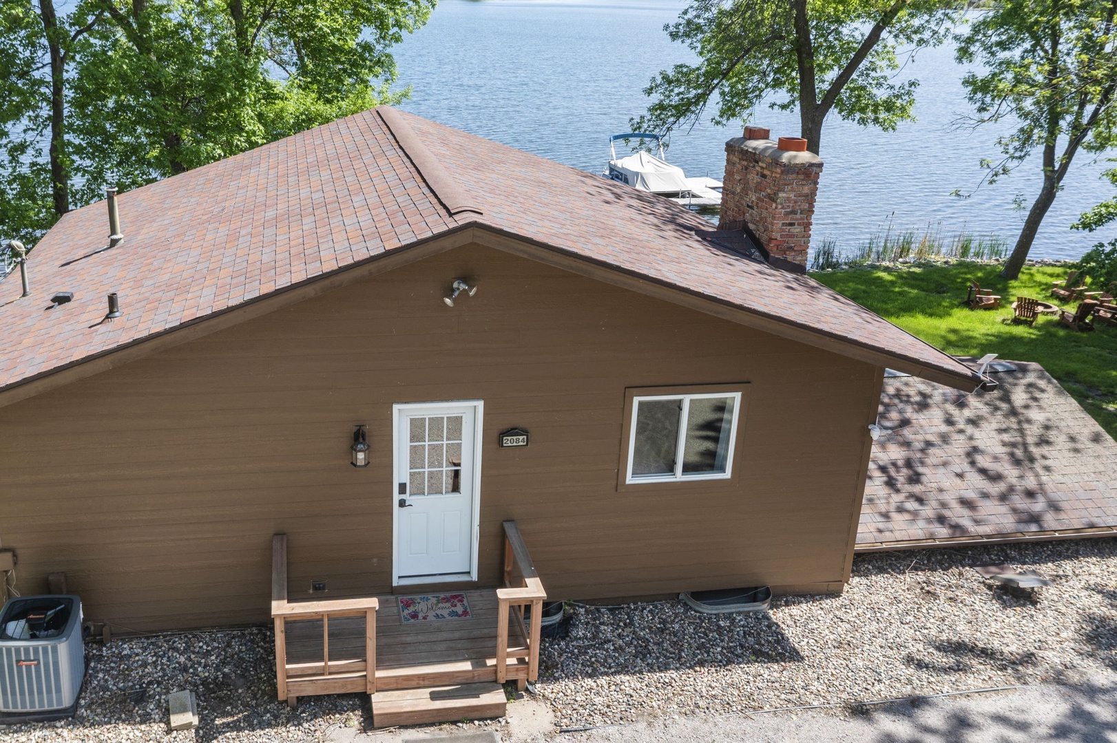 Charming lakeside cottage with private dock access and waterfront setting—your peaceful escape surrounded by natural beauty.