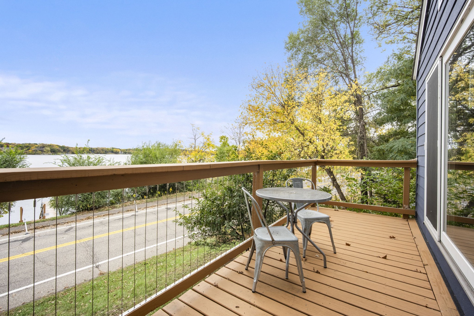 Step out onto your private balcony and take in stunning lake views framed by vibrant fall foliage. This peaceful spot is perfect for your morning coffee or a quiet moment by the water.