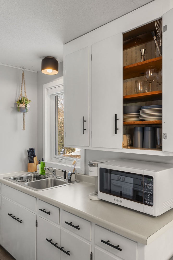 Your fully equipped kitchen features modern appliances and ample storage, perfect for preparing meals during your stay.