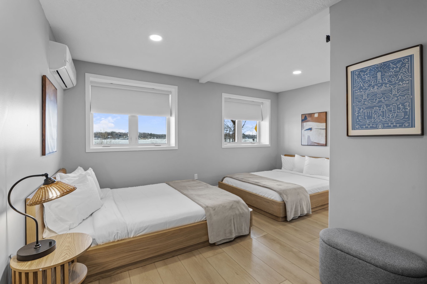 Bright bedroom with two cozy beds