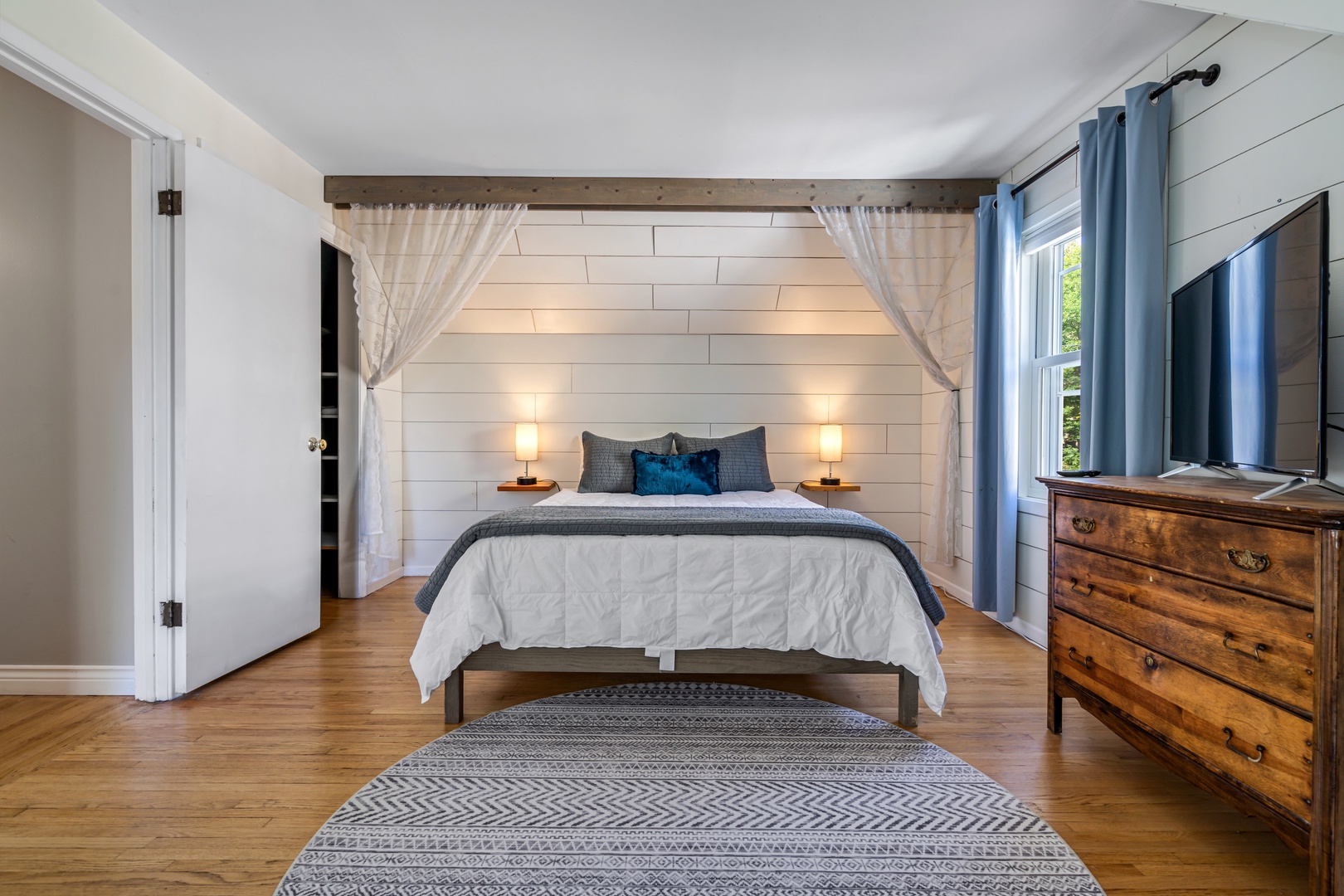 Drift off in your dreamy canopy bed, where soft curtains and warm lighting create the perfect sanctuary for peaceful nights.