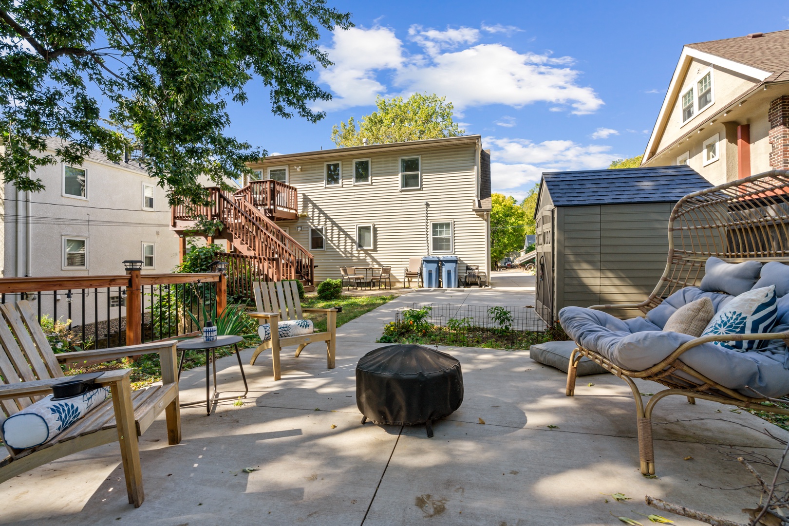 Sunny, shared patio with comfy seating and chill vibes