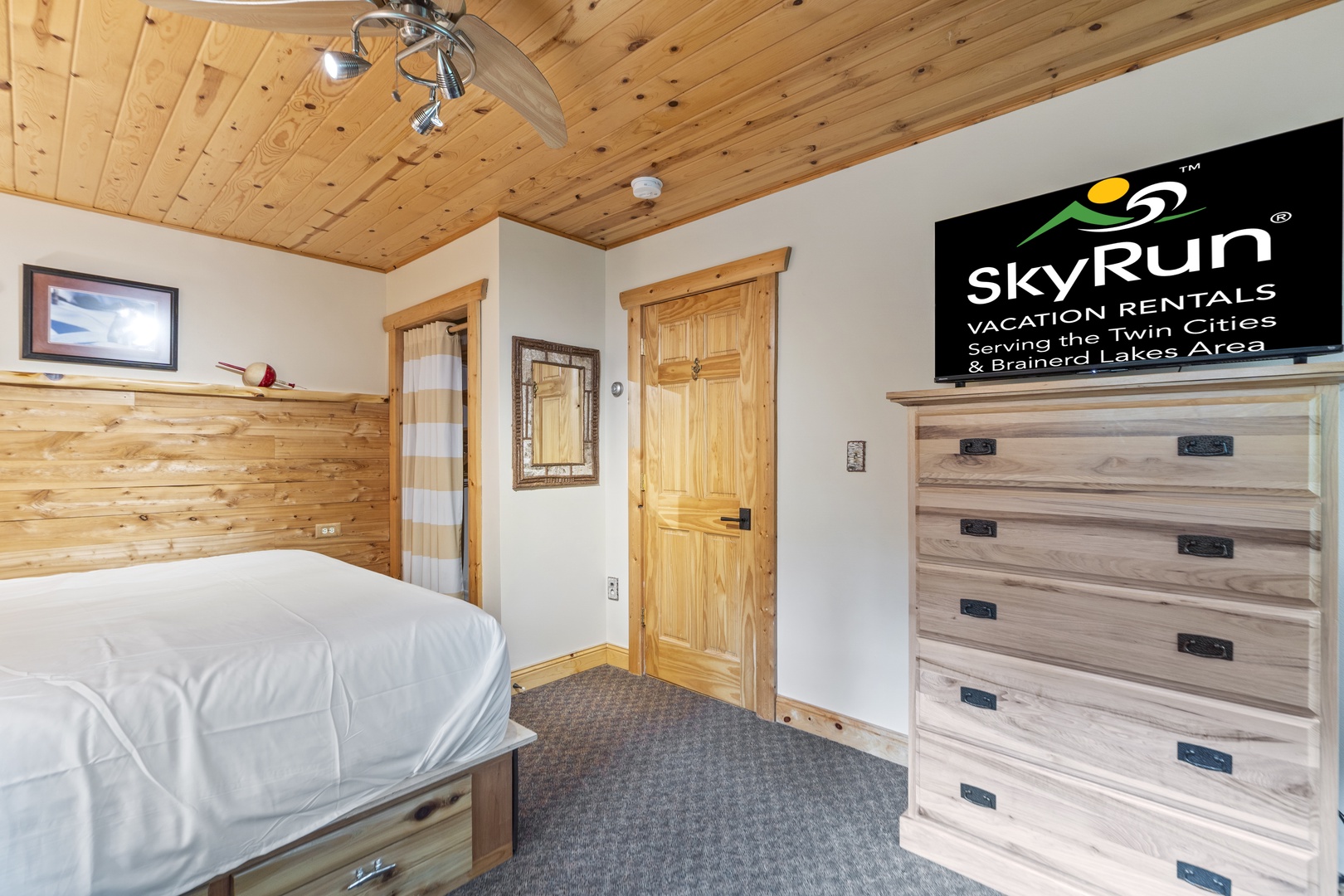 Unwind in your cozy bedroom with rustic wood details, a comfortable bed, and ample storage for all your belongings.