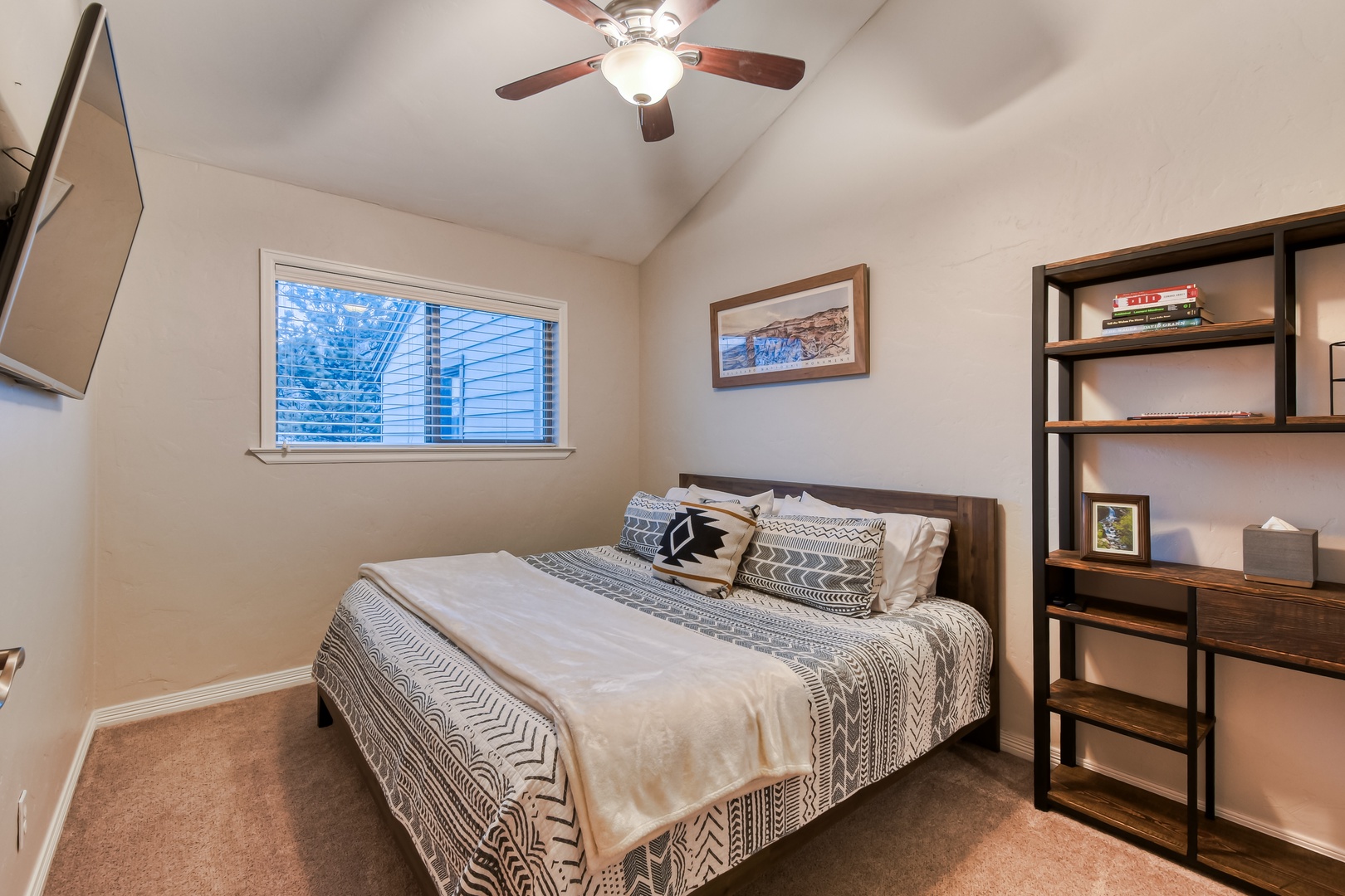 Unwind in your cozy bedroom with ceiling fan for perfect comfort.
