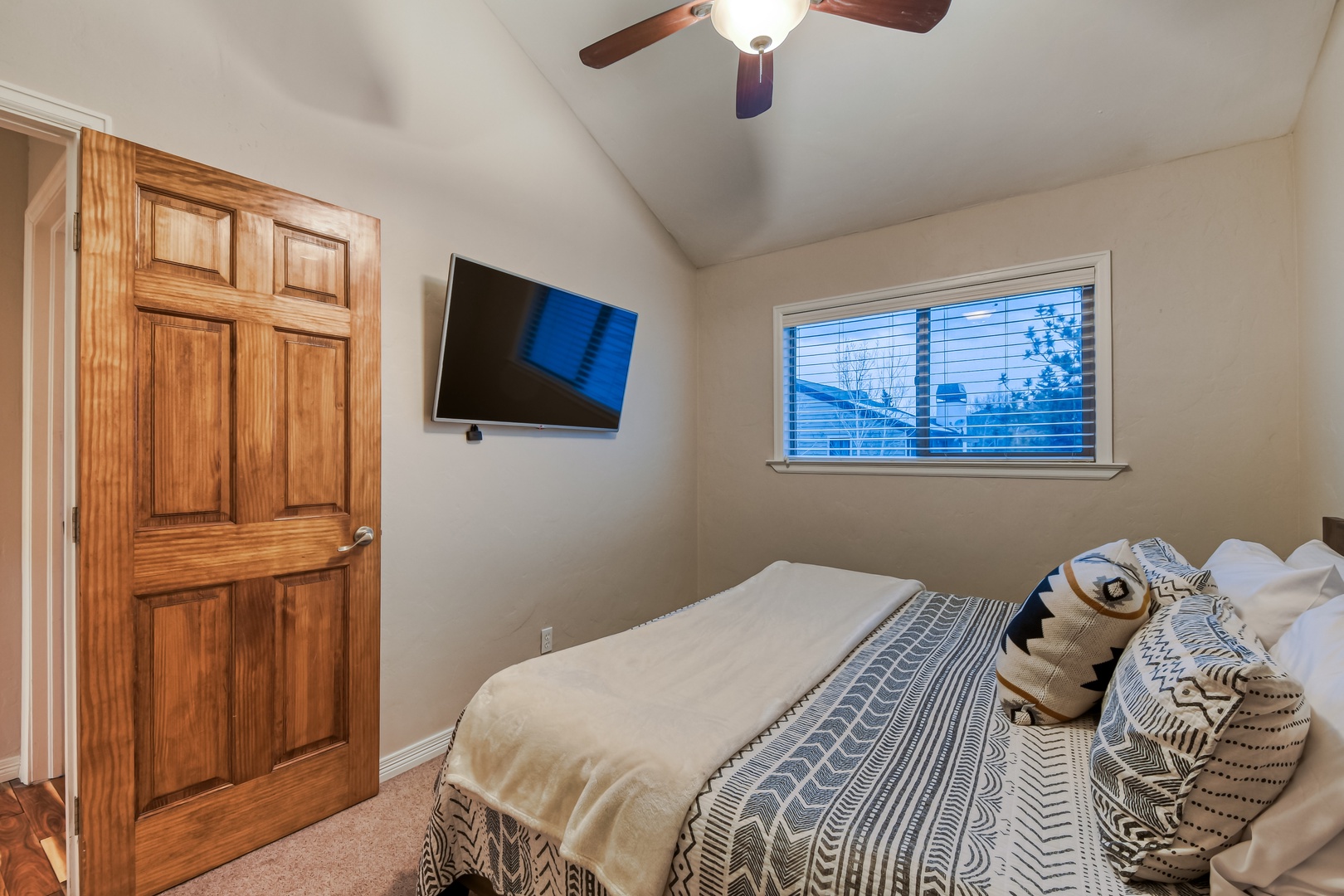 Rest easy in your cozy bedroom with window views for ultimate comfort.