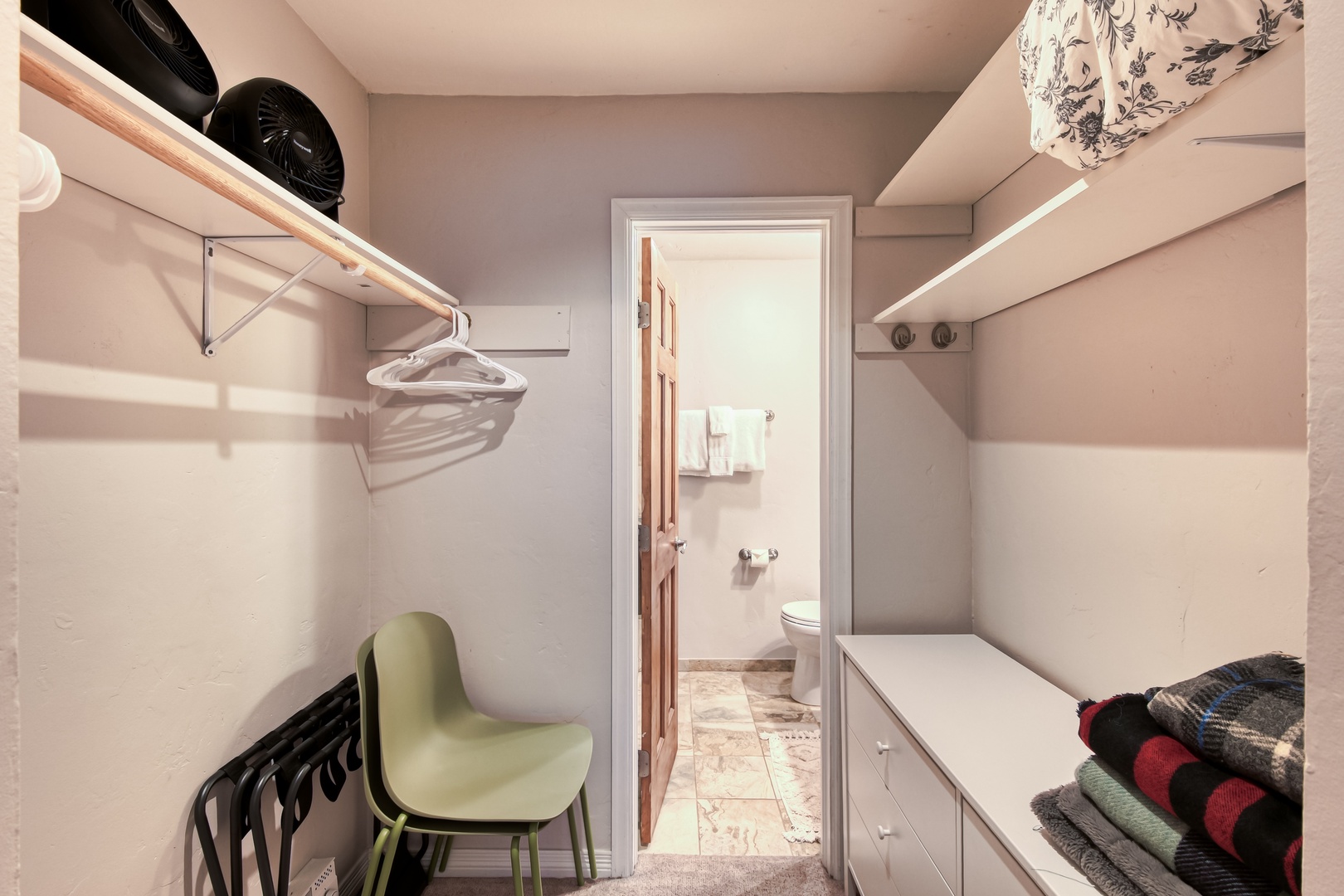 Your walk-in closet offers ample hanging space and storage