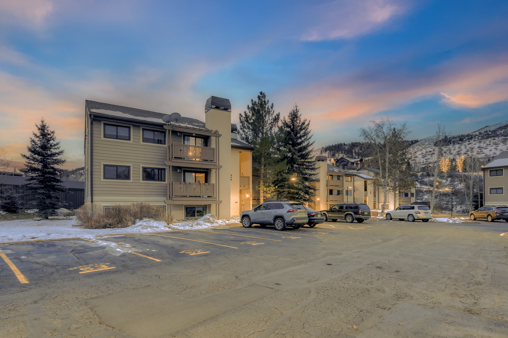 Multi-story mountain resort buildings with convenient parking