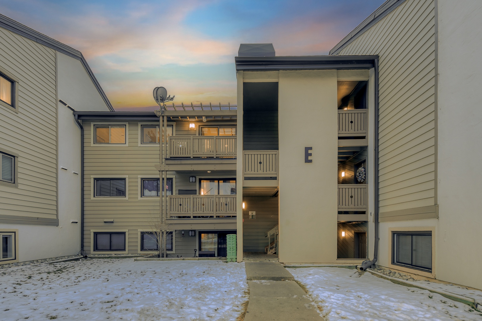 Multi-level apartment complex with covered balconies