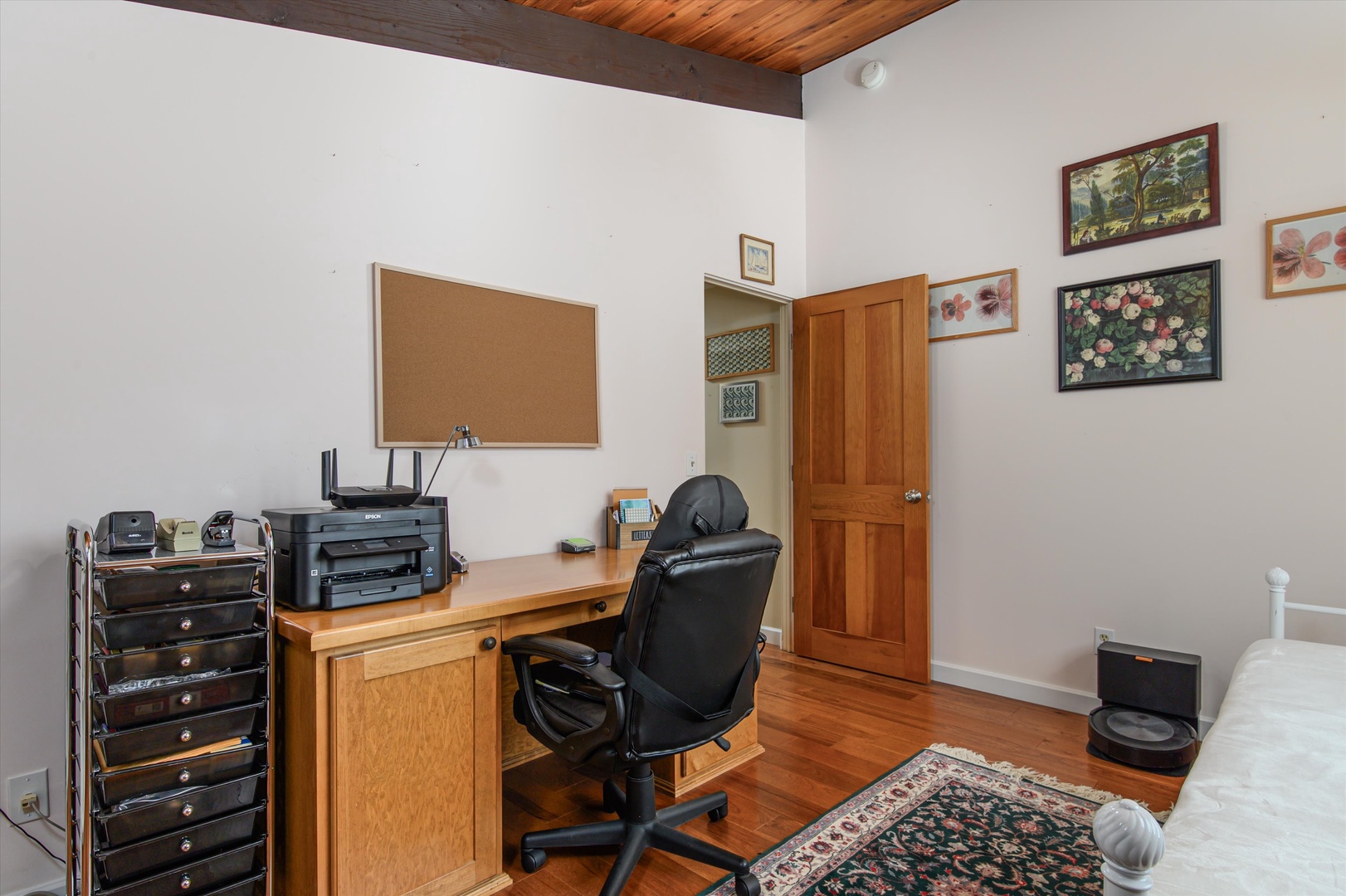 Dedicated workspace with a desk and office chair, perfect for remote work or study.