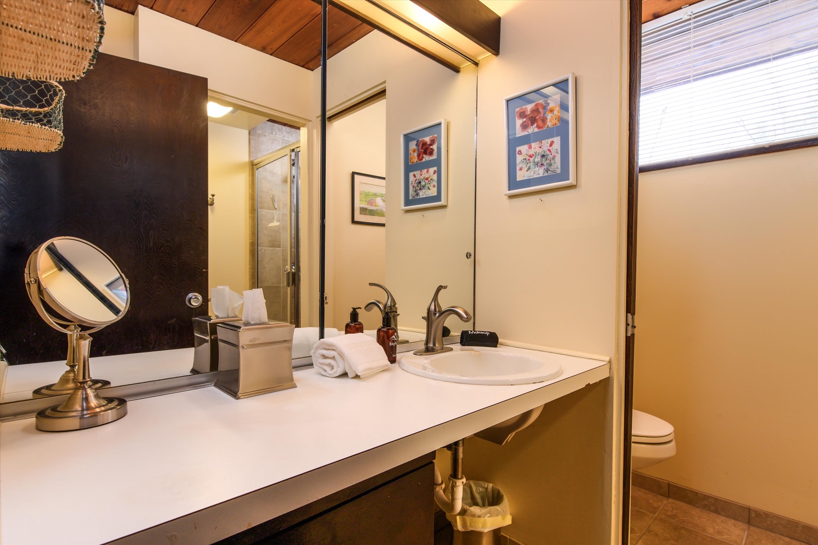 Enjoy this well-appointed lower-level bathroom with everything you need for a convenient and comfortable routine.