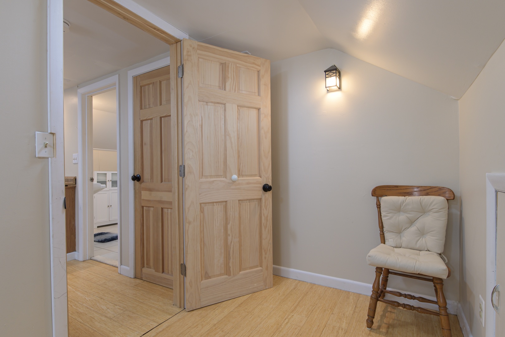 Spacious upstairs office area with a comfortable desk and chair, giving you a quiet spot to focus or create.