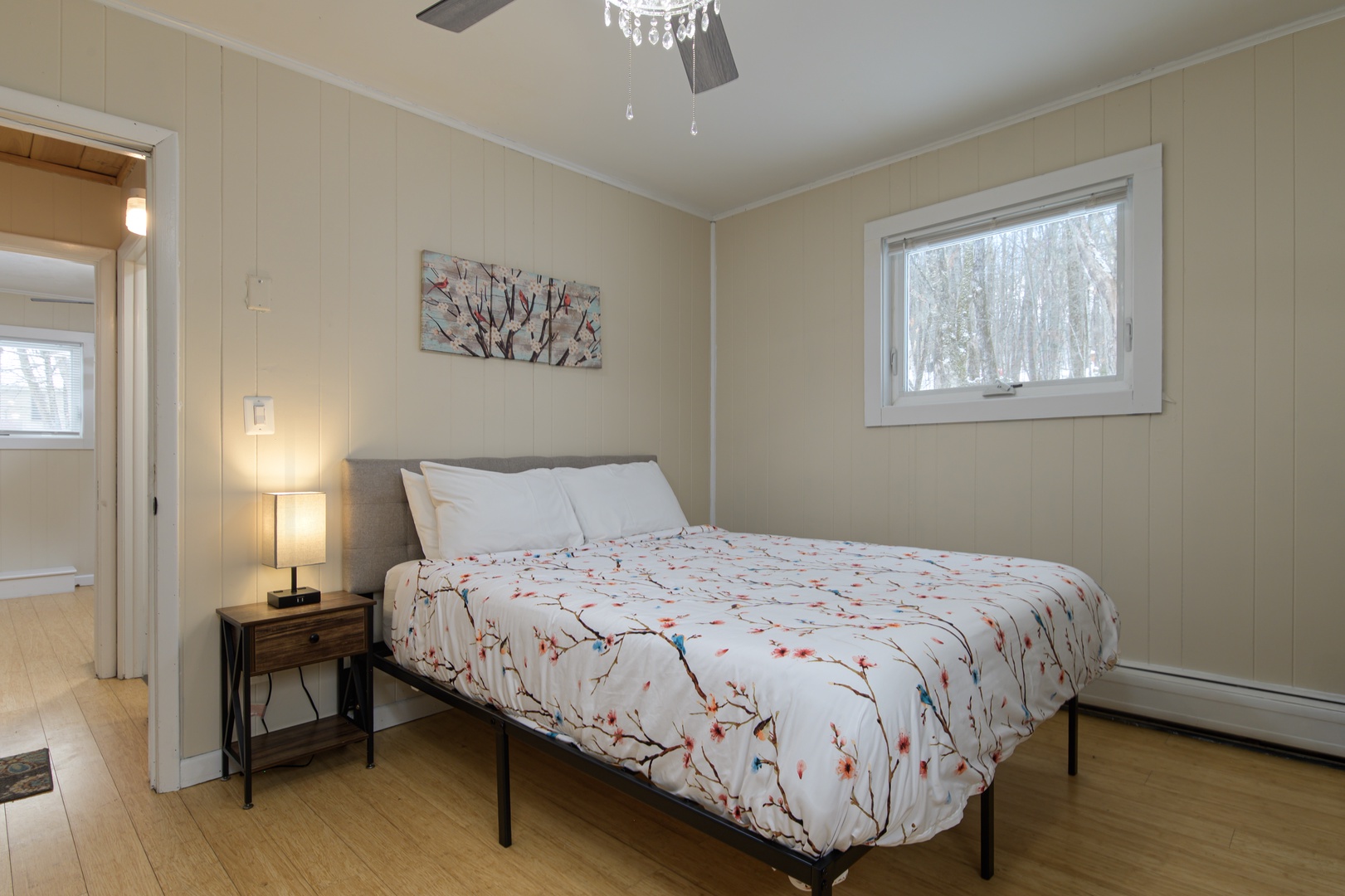 Drift off peacefully in this serene bedroom with soft linens and gentle natural light filtering through your window.