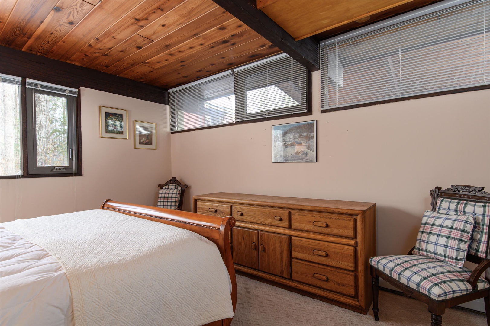 Unwind and recharge in this comfortable lower-level bedroom with a queen bed.