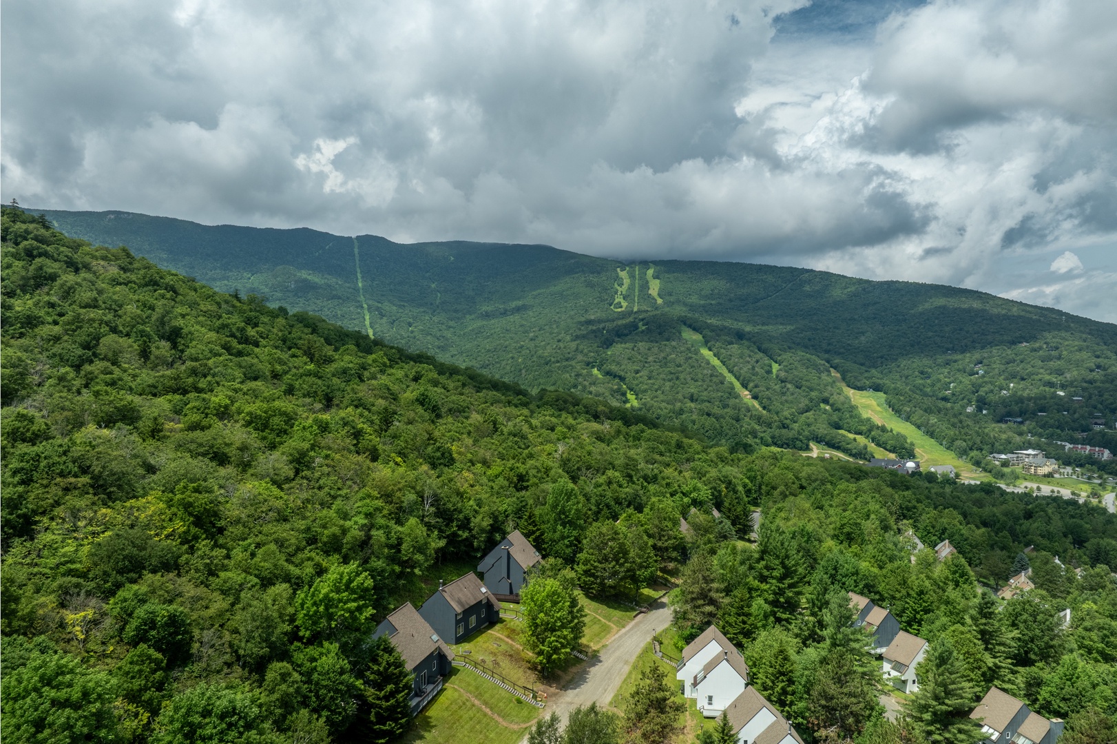 Nestled in lush mountains, this property offers a serene mountain retreat with ski slopes and forested surroundings—an ideal base for all-season adventure.