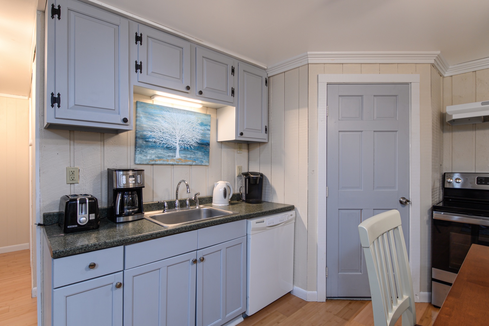 Cook, chat, and create memories in the cozy, lower level kitchen with all the tools and appliances you need.