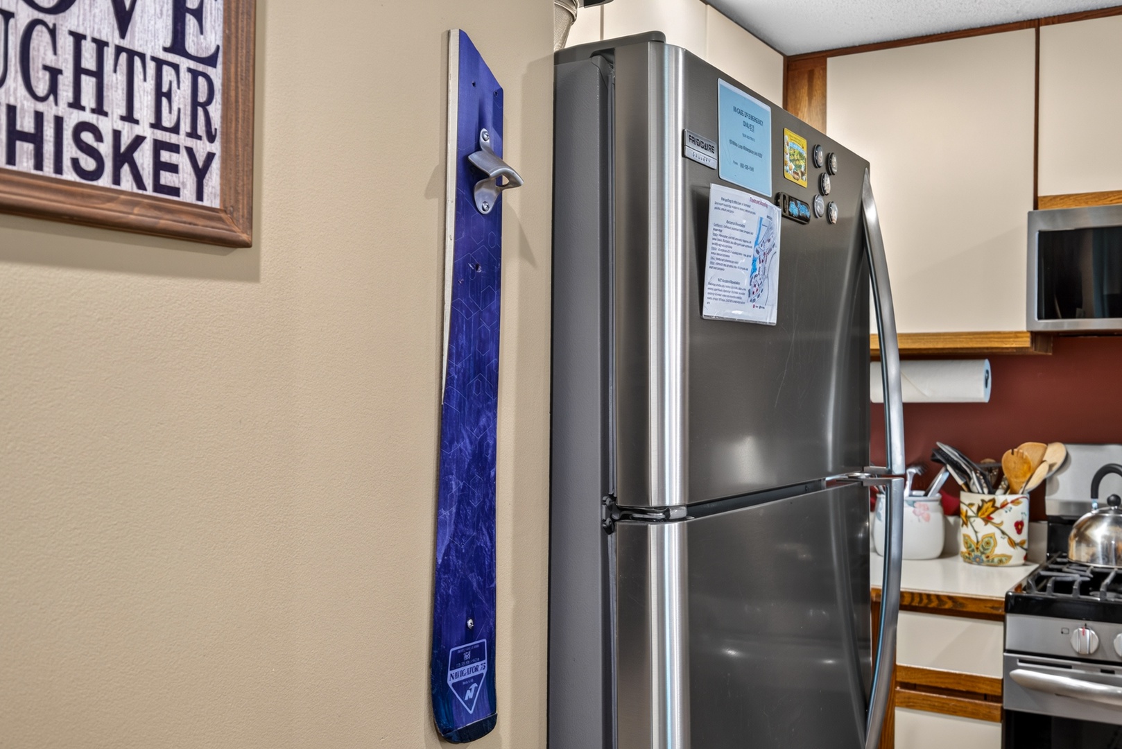 Your fully equipped kitchen awaits, complete with a modern stainless steel refrigerator and all the essentials you'll need to prepare meals during your stay.