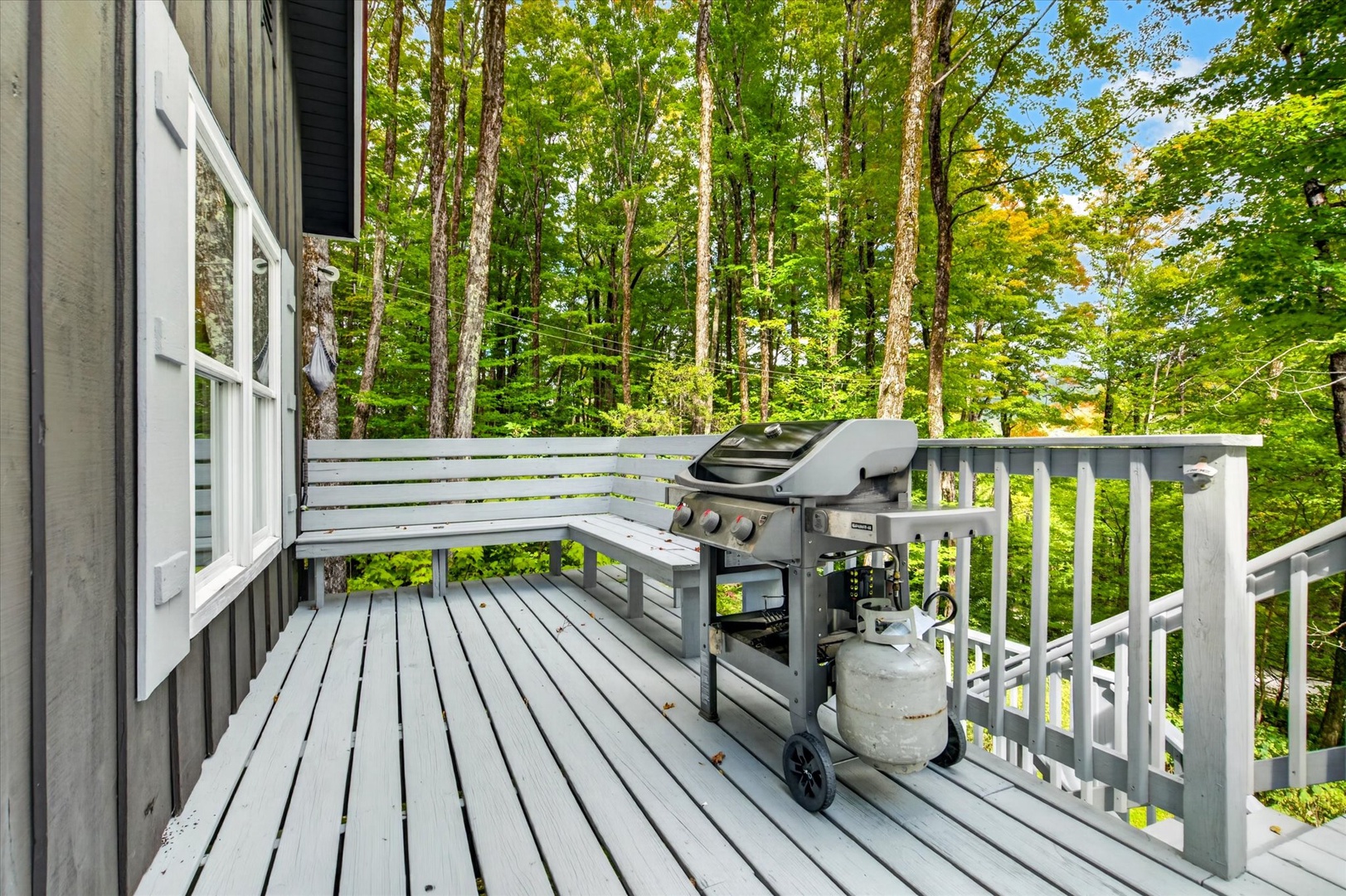 Step onto your private deck surrounded by lush forest canopy. Fire up the grill and savor meals with nature as your backdrop—peaceful, secluded, and utterly yours.