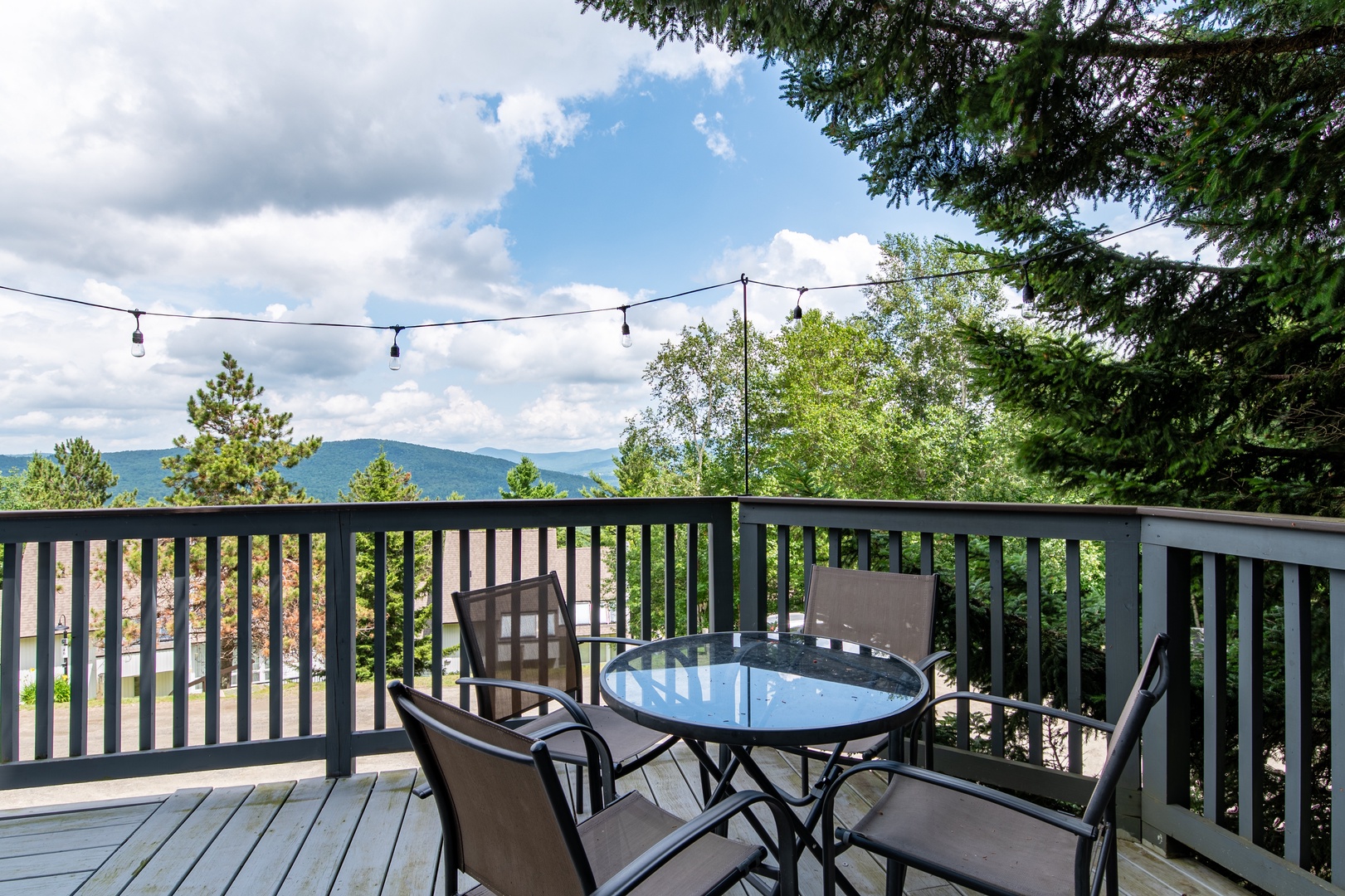 This scenic mountain-view deck offers peaceful seating where you can sip your morning coffee and enjoy the views of the Green Mountains.