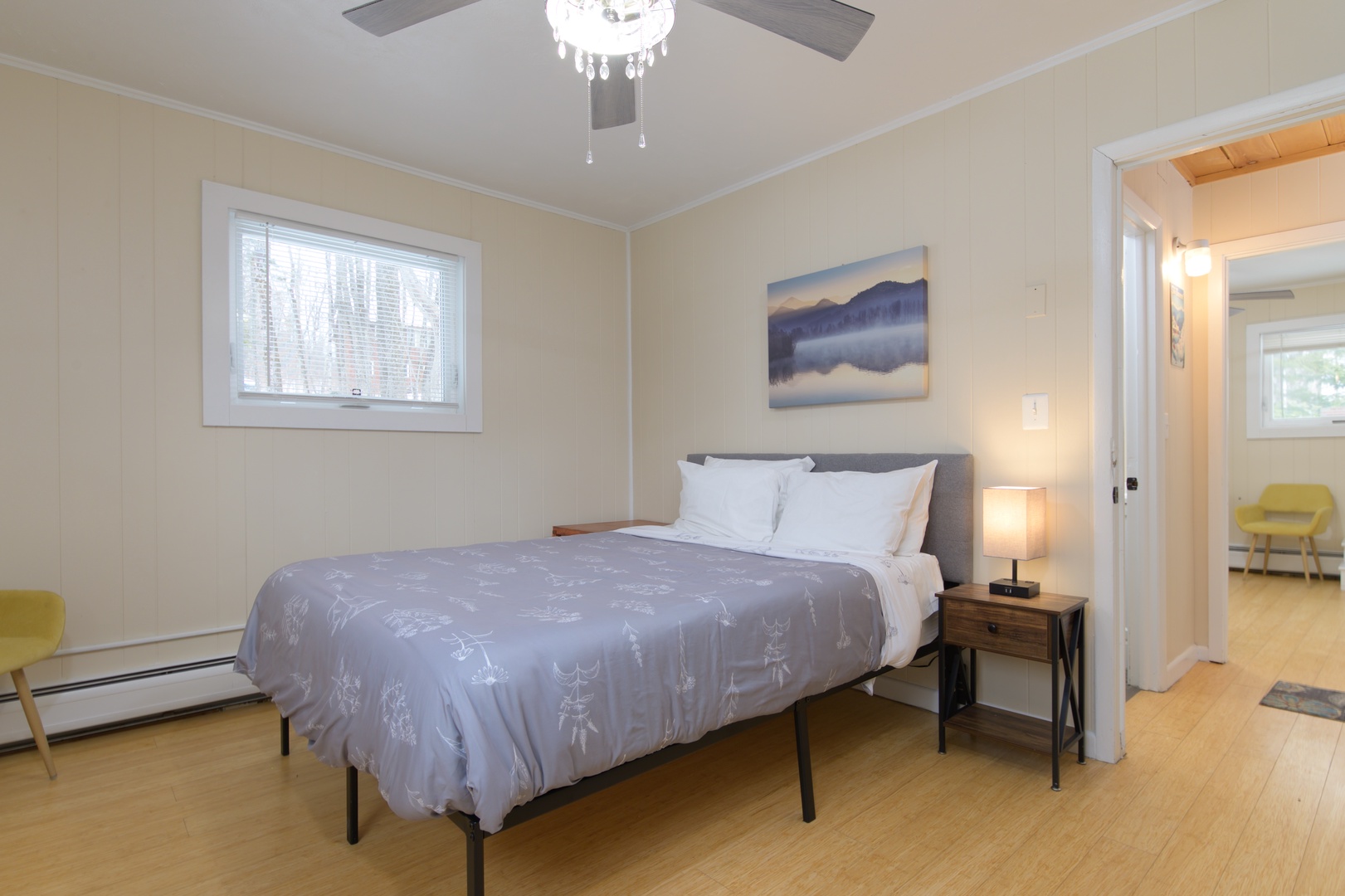 A spacious bedroom with a queen bed, perfect for relaxing after a day exploring the area.