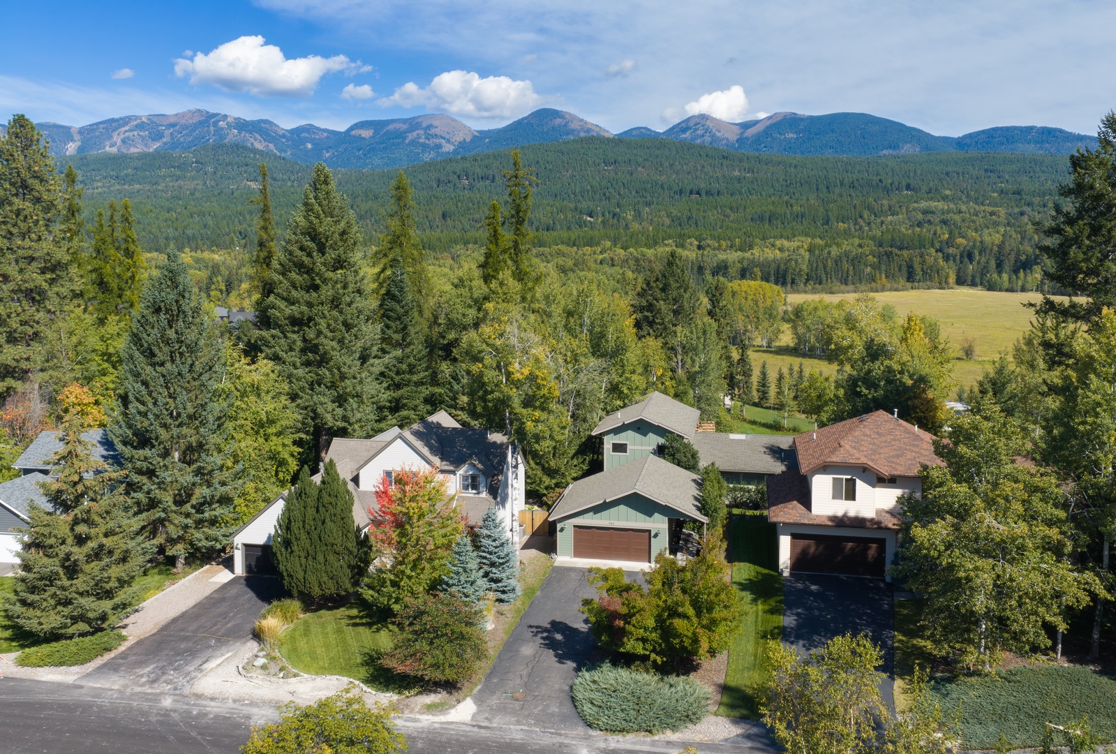 Nestled in a serene mountain valley, this property offers panoramic views of forested peaks and expansive natural landscapes, perfect for a peaceful getaway.