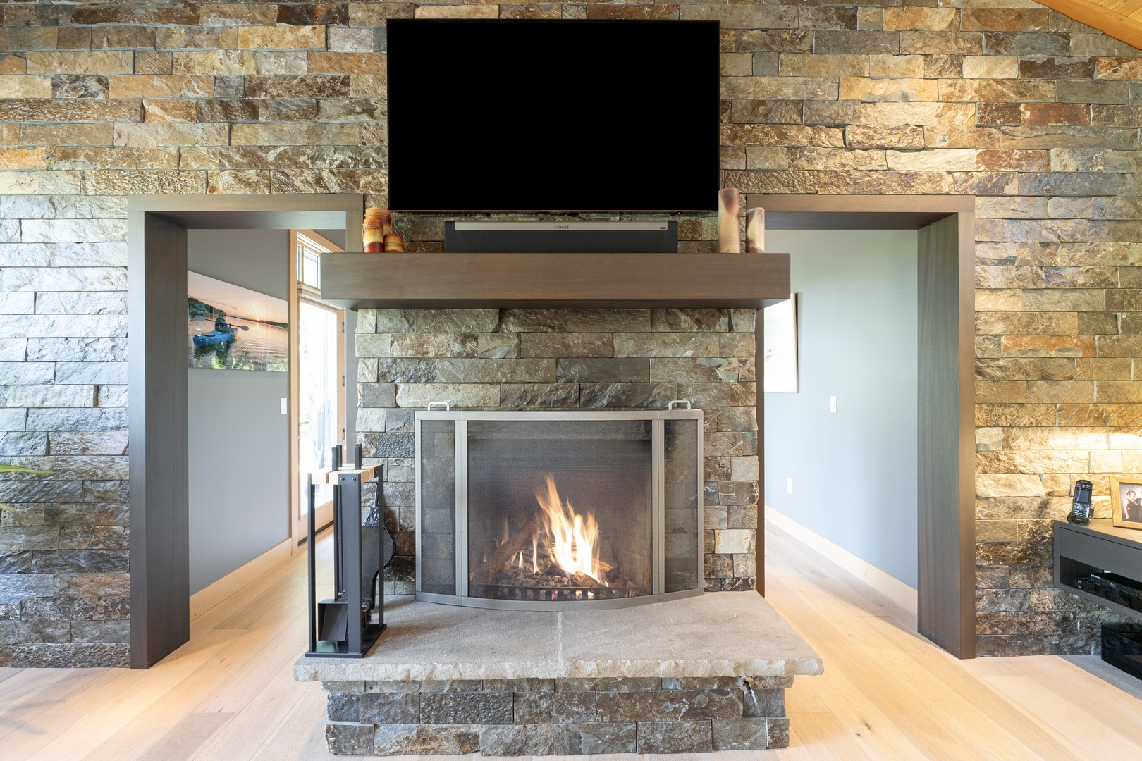 Cozy up by your private fireplace beneath the striking stone accent wall. The warm flames and natural textures create the perfect backdrop for relaxing mountain evenings together.