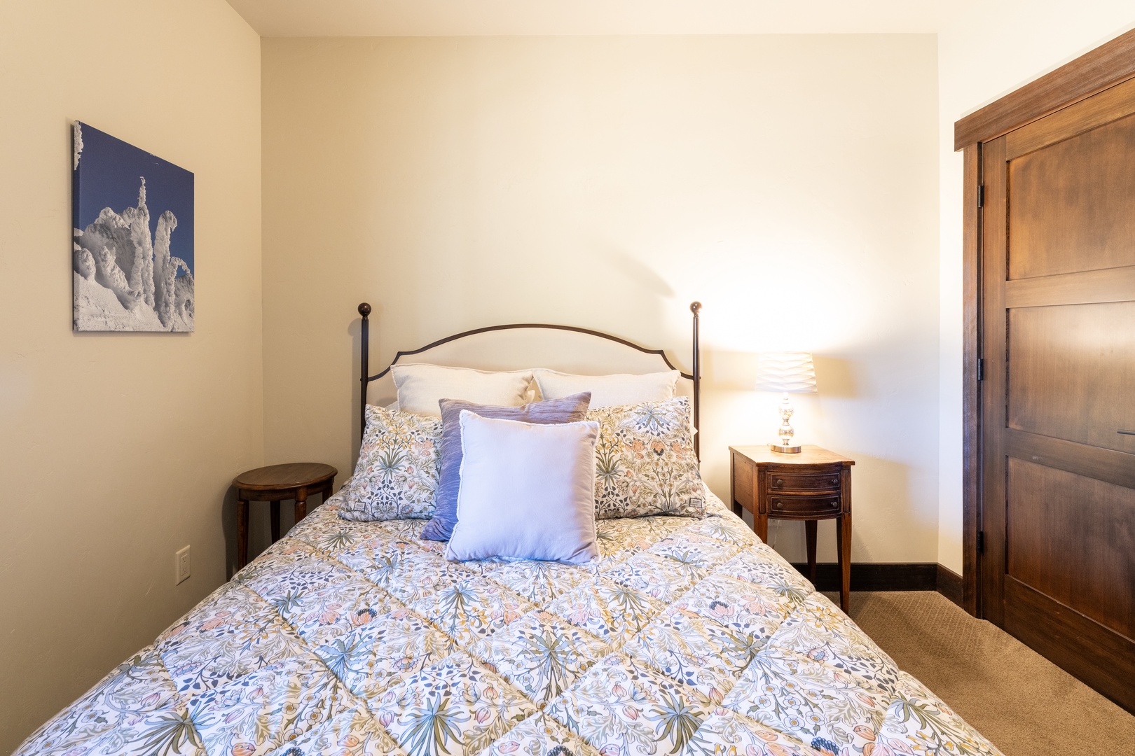 Slip into a restful sleep under soft, beautifully detailed linens in this peaceful bedroom that feels like your own private sanctuary.