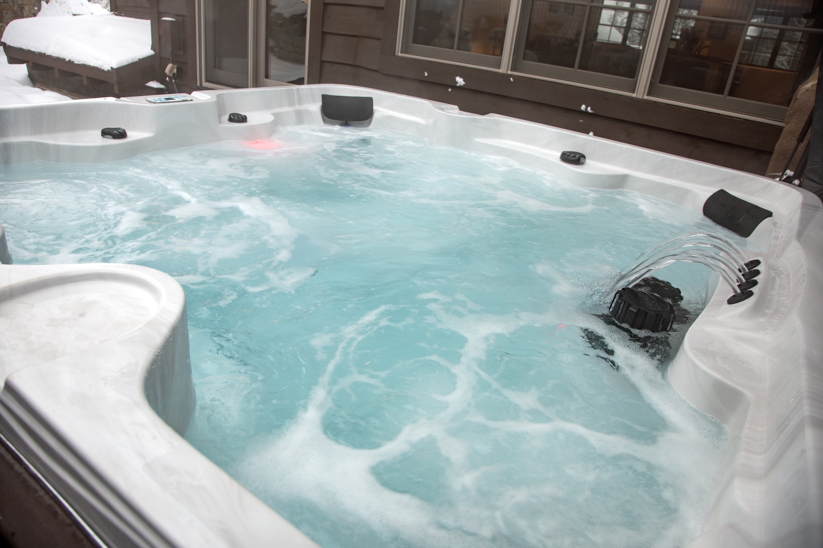 Soak under snowy skies