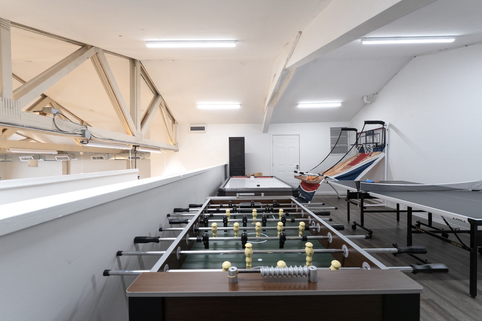 Your own private game room awaits with foosball, ping pong, basketball arcade, and air hockey—perfect for friendly competition and making vacation memories together.