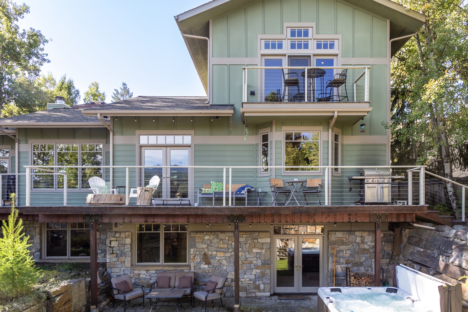 This multi-level property offers a spacious retreat surrounded by greenery. Multiple private balconies and outdoor seating areas give you plenty of room to unwind, soak in natural light, or fire up the grill.