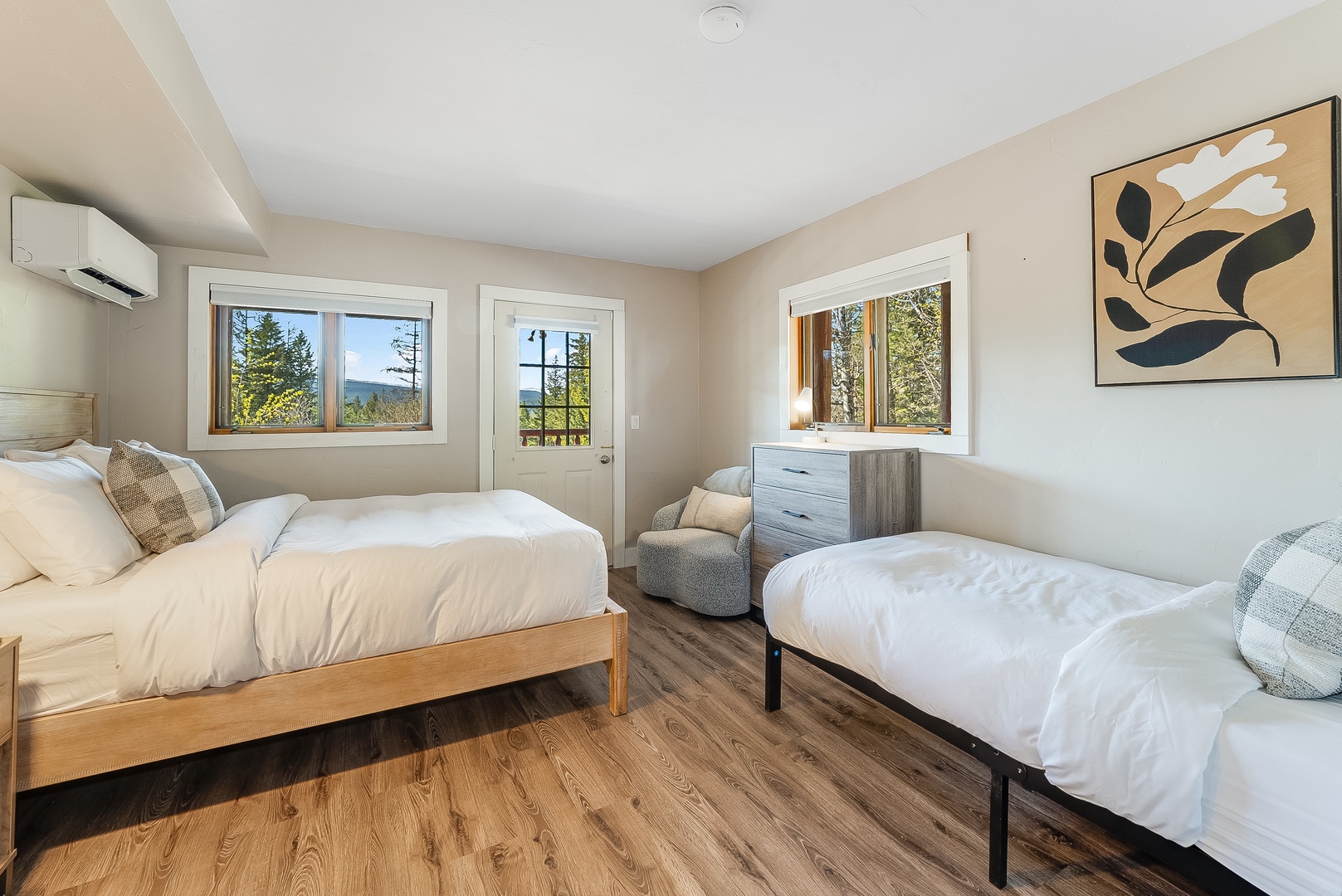 Drift off in this peaceful bedroom with crisp linens, soothing neutral tones, and mountain views framed by every window—your restful retreat awaits.